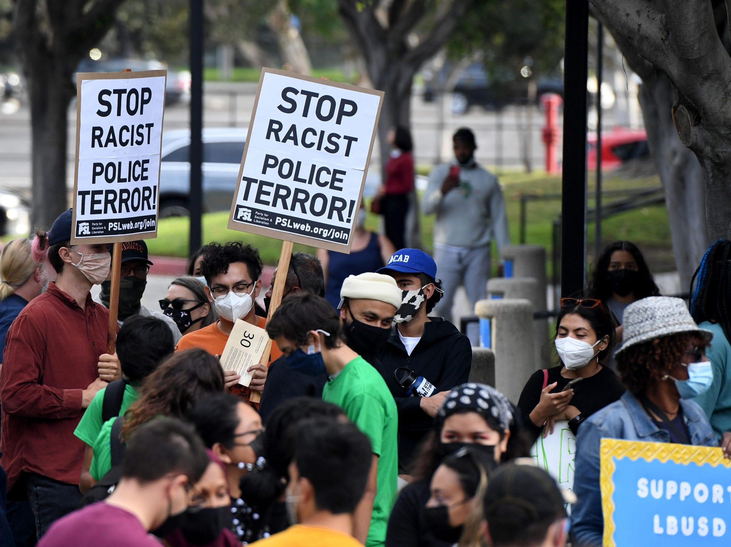 The crowd gathered at the LBUSD headquarters to learn that the board unanimously voted to terminate school safety officer Eddie F. Gonzalez who was involved in the shooting death of Manuela Rodriguez on Monday, September 27.