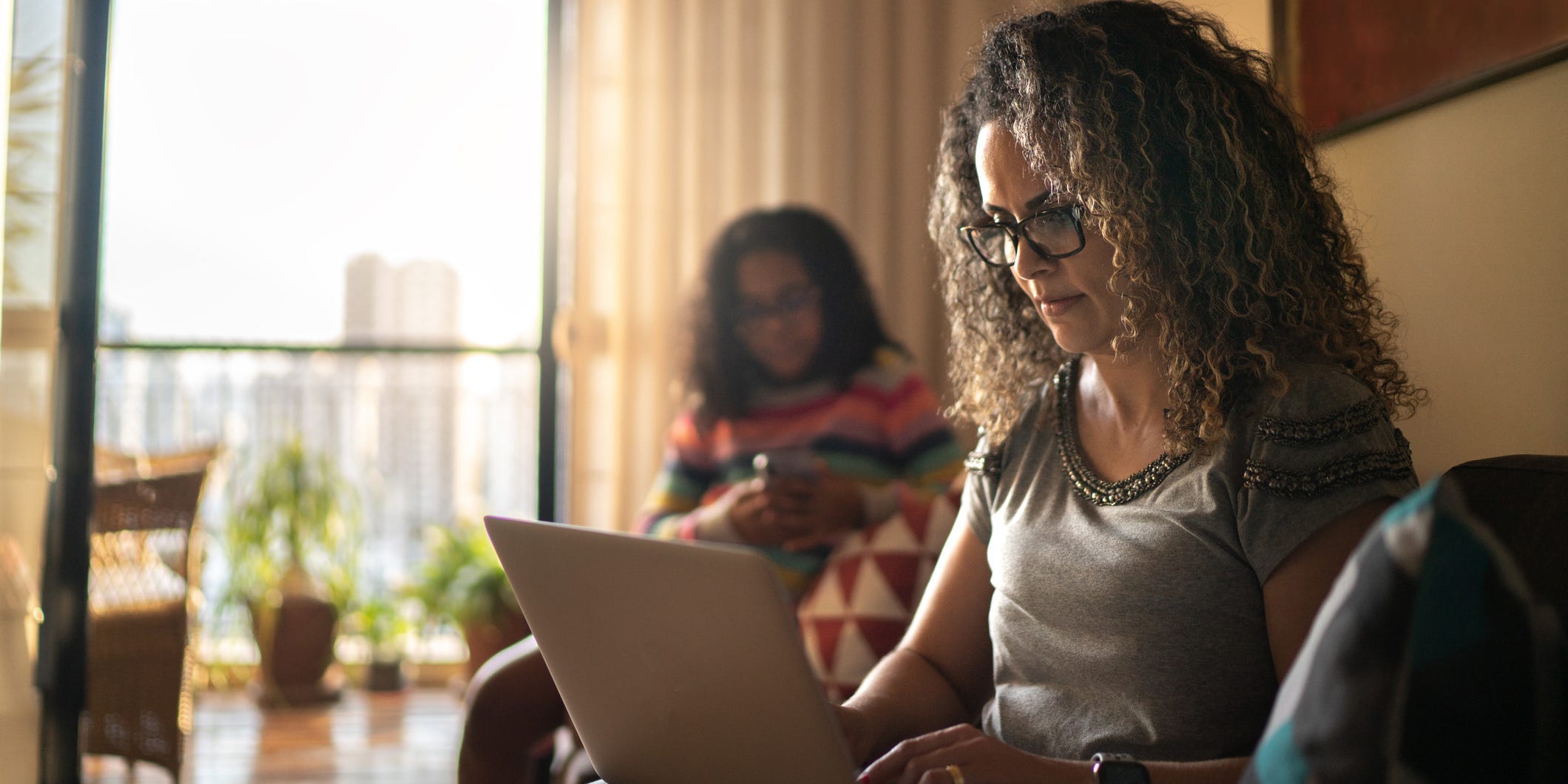 woman using computer at home
