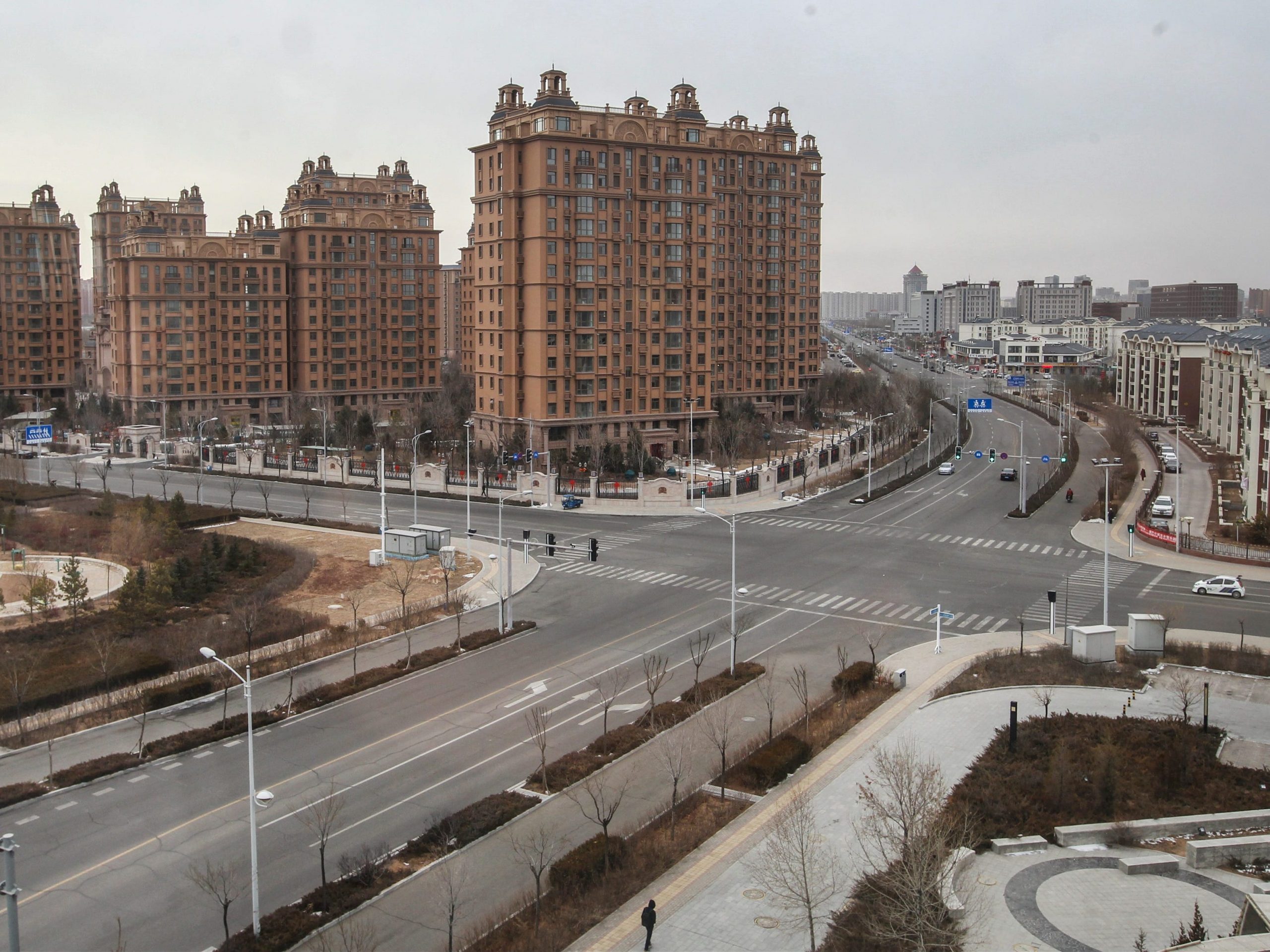 An aerial shot of Kangbashi district, Ordos city, shows huge buildings and no people.