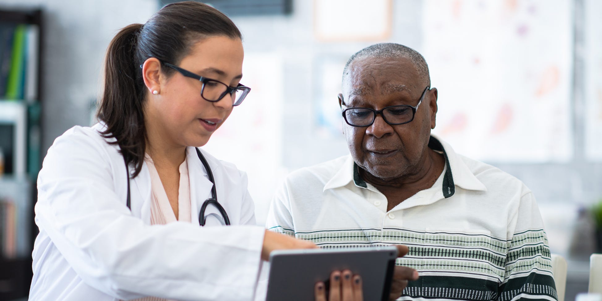 female doctor talking to man