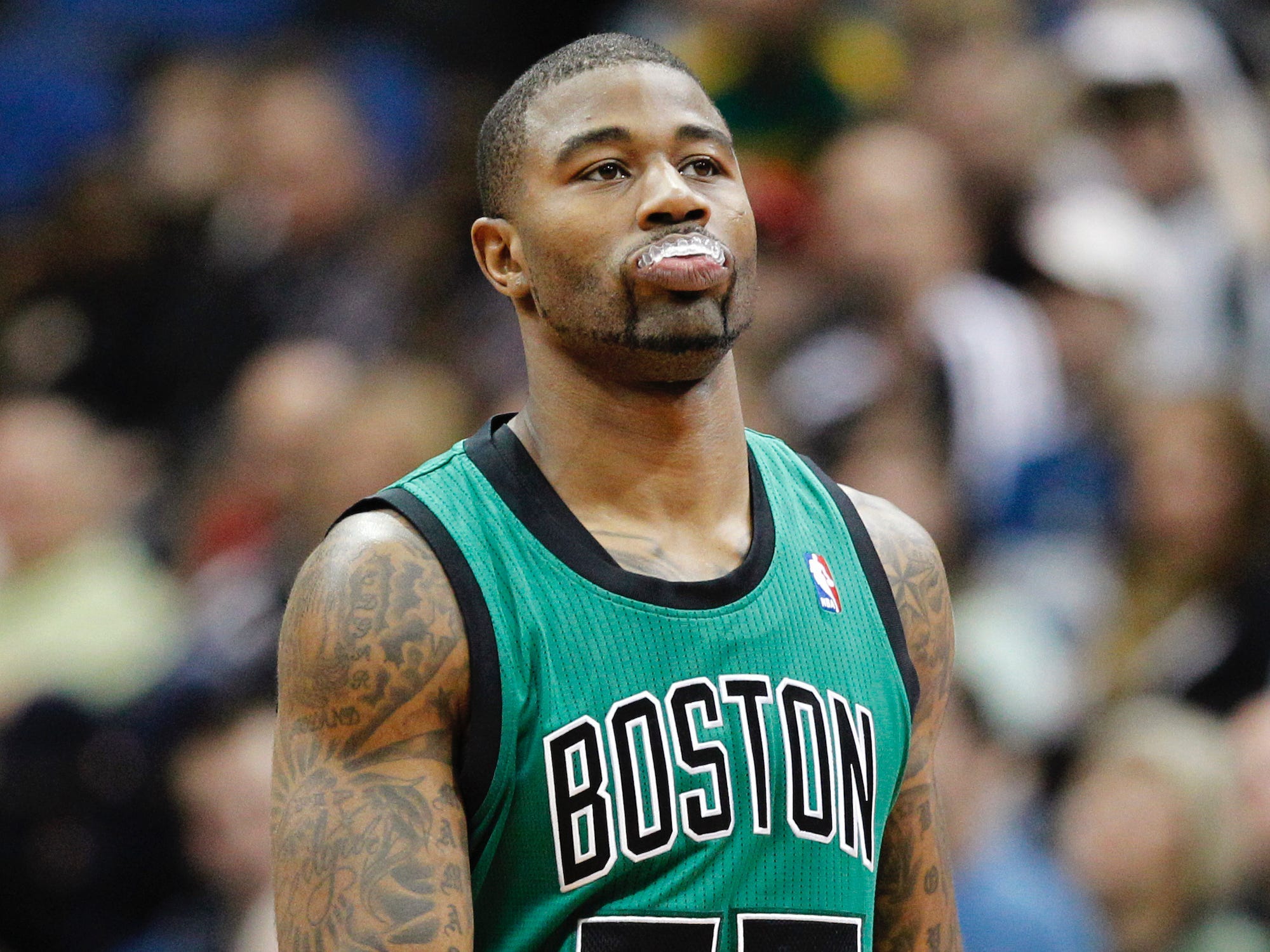 Terrence Williams walks on the court during a Celtics game in 2013.