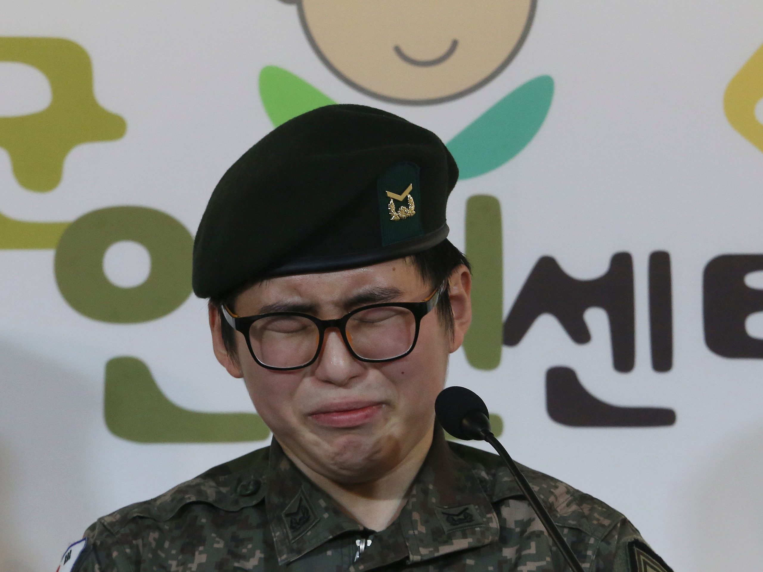 Byun Hee-Soo cries during a press conference