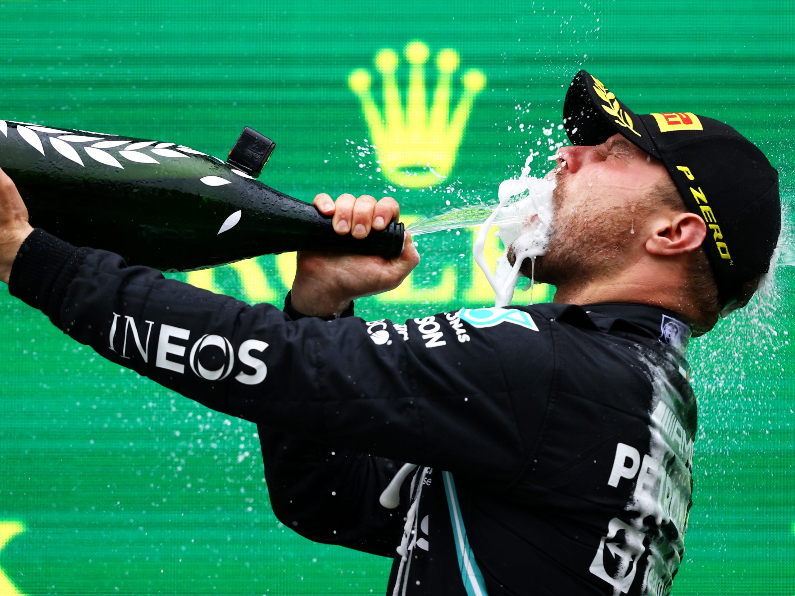 Race winner Valtteri Bottas of Finland and Mercedes GP celebrates on the podium during the F1 Grand Prix of Turkey