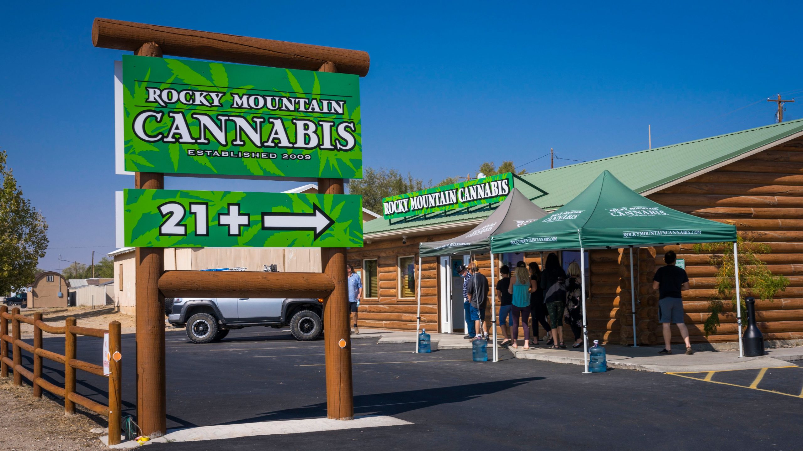 People in line at Rocky Mountain Cannabis Store, a cannabis dispensary in Dinosaur, Colorado.