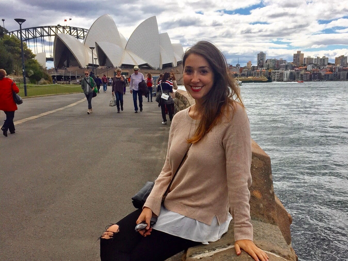 Emily Hochberg in front of the Sydney Opera House in Australia