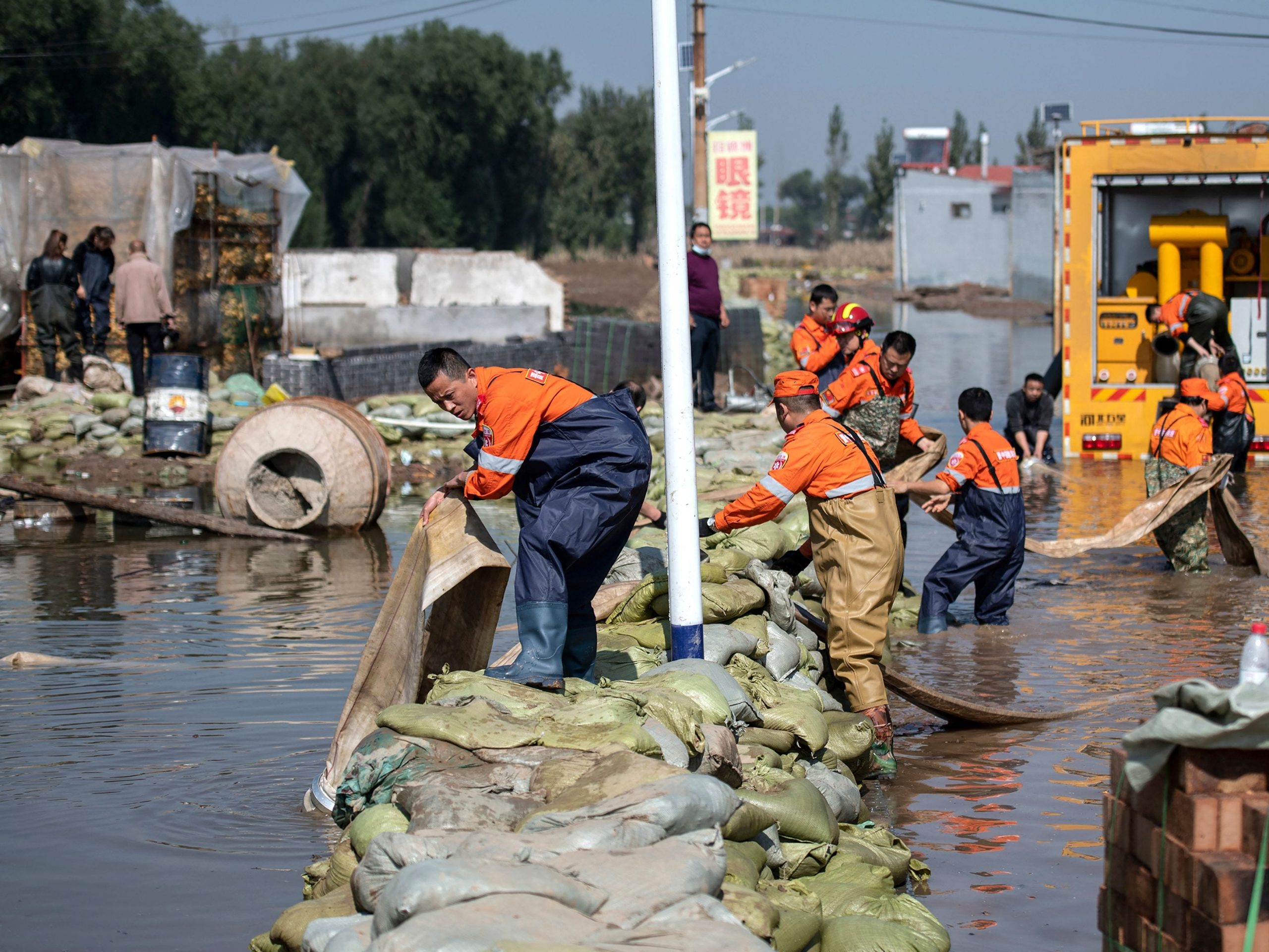 Rescue workers working at a flood in China, Shanxi province.