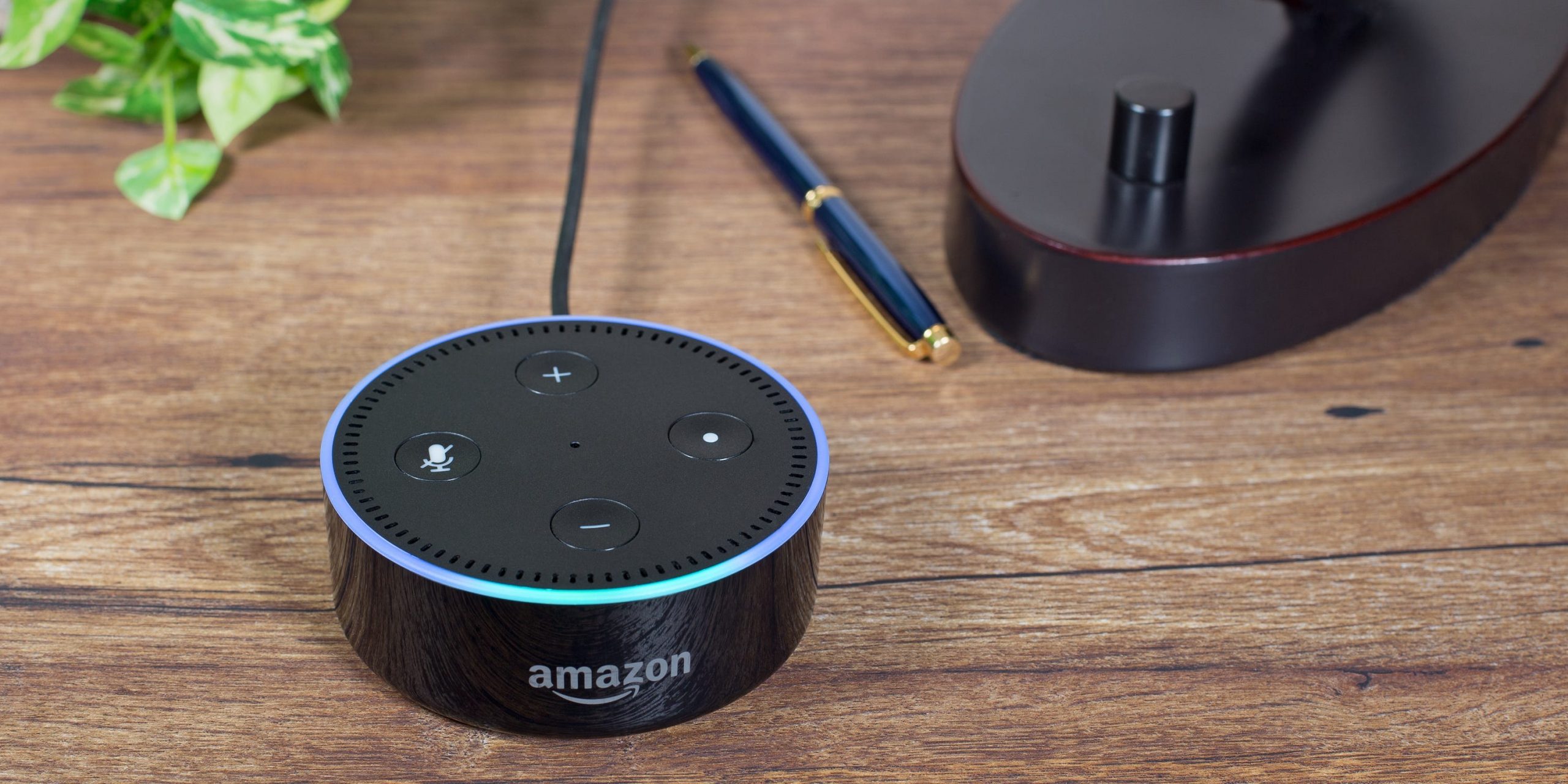 An Amazon Echo Dot sitting on a table