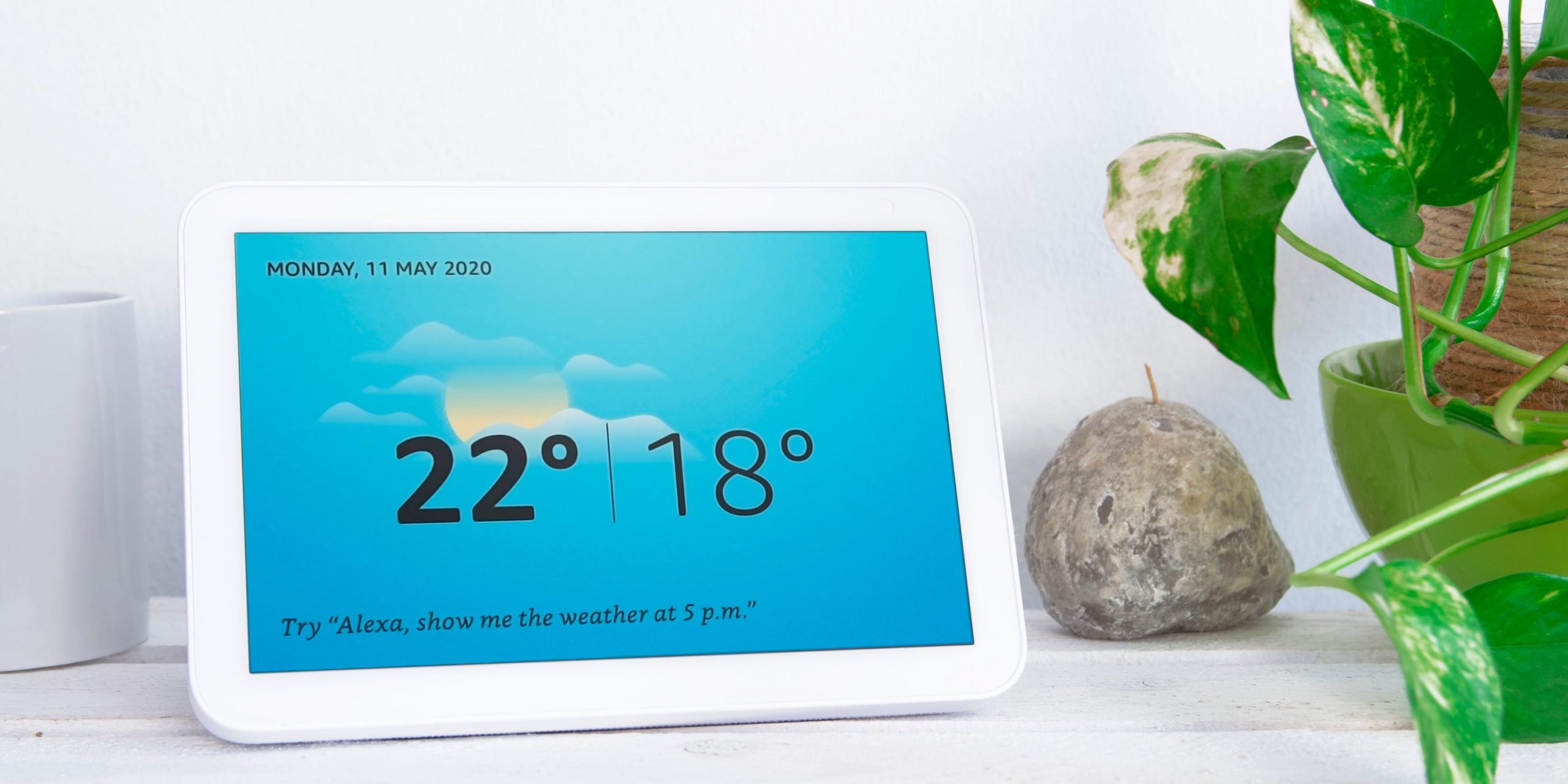 An Amazon Echo Show, displaying the weather.