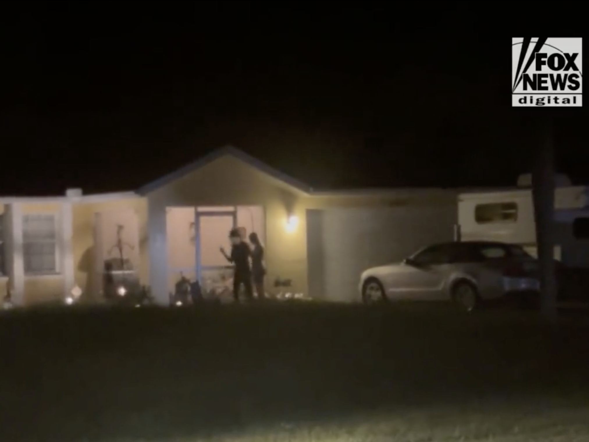 Protesters seen at the home of Brian Laundrie on October 12.