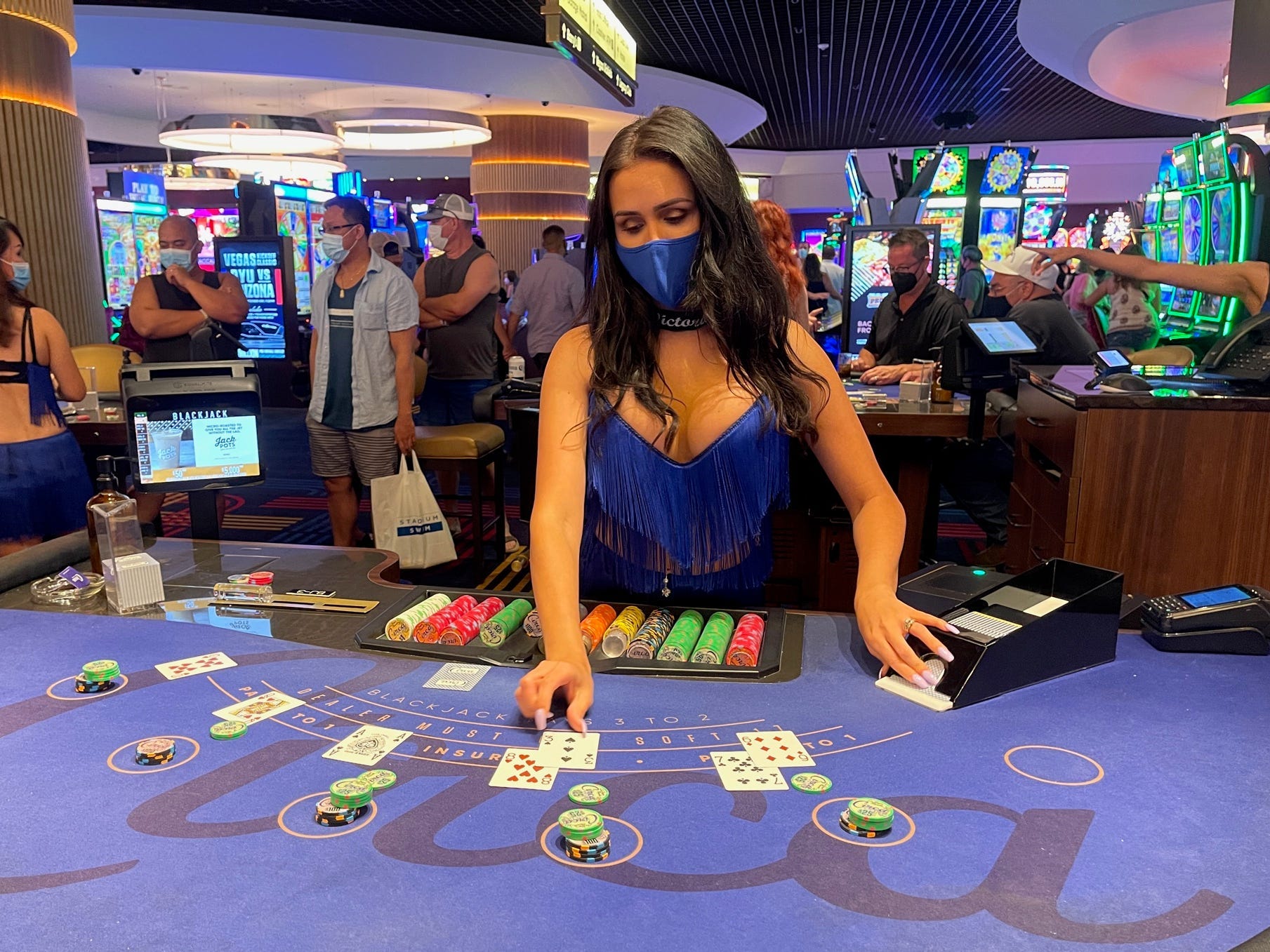 Victoria Silva dealing blackjack