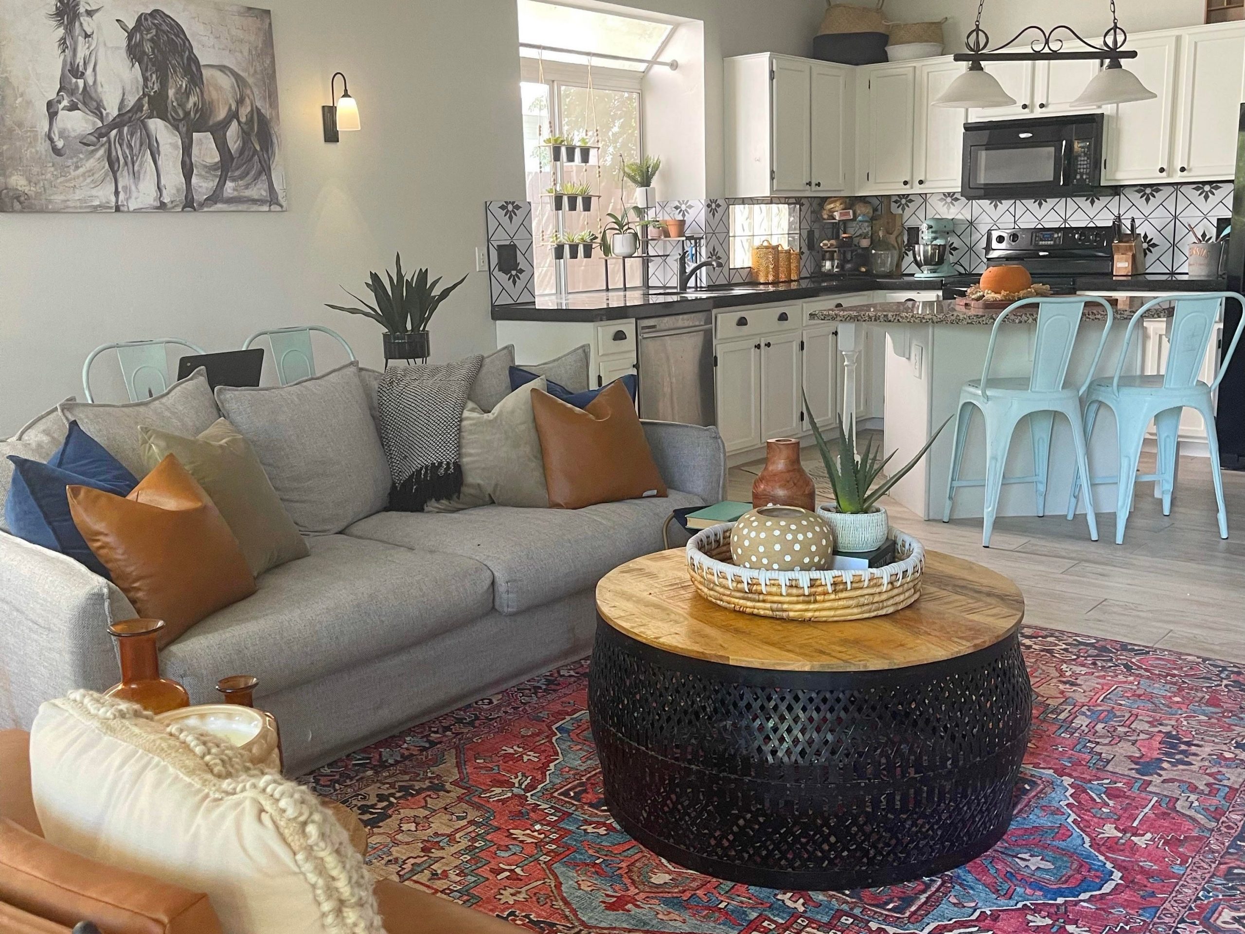 A living room and kitchen in a rental home.