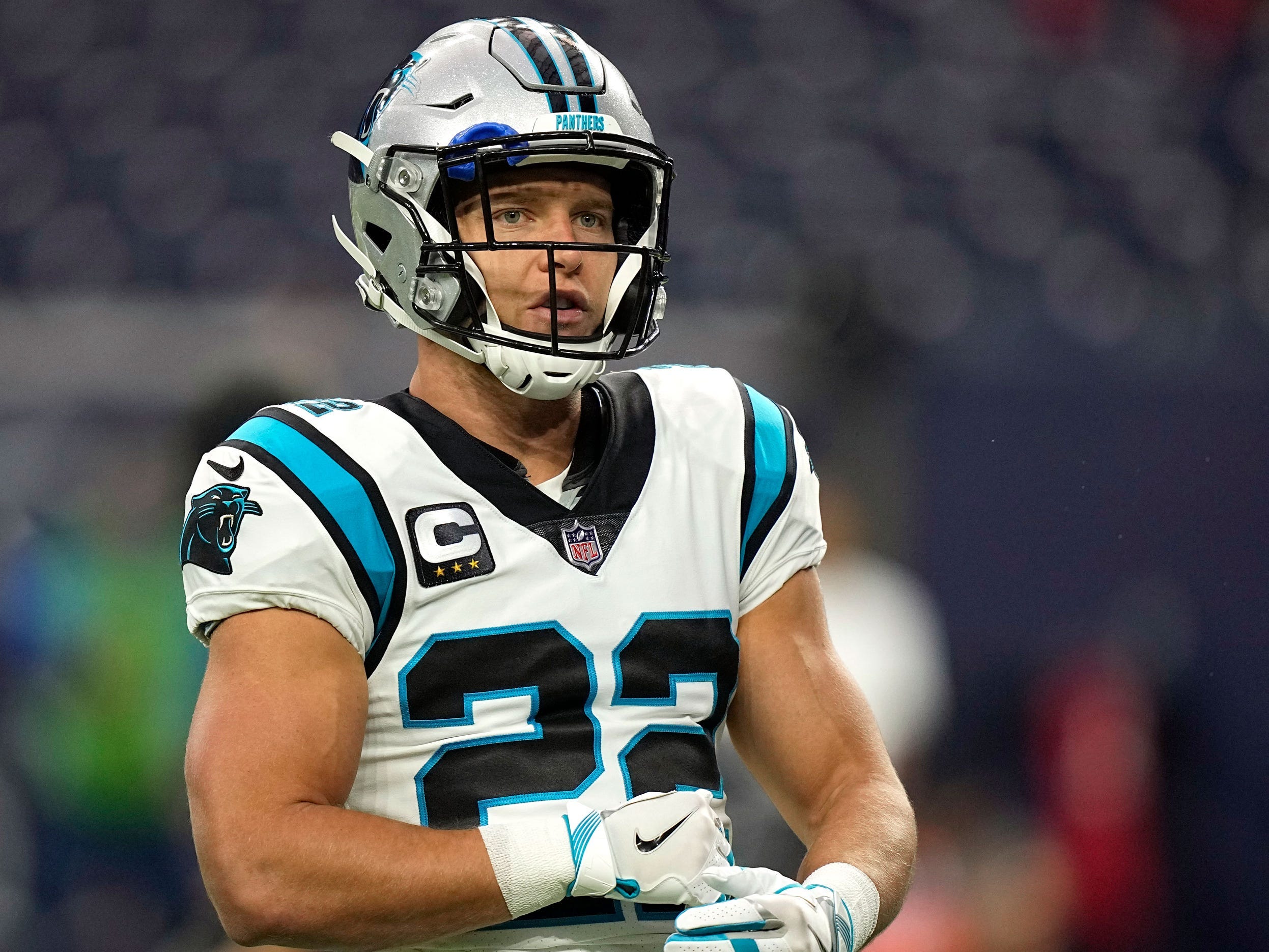 Christian McCaffrey warms up before a game against the Houston Texans.