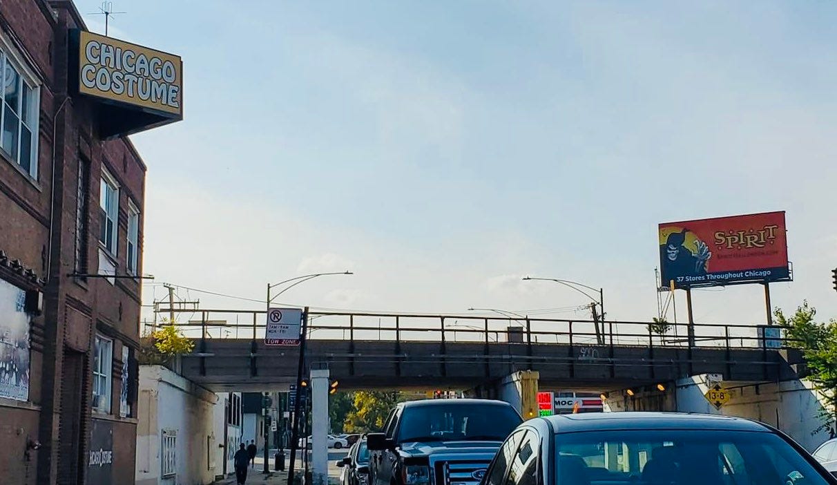 A Spirit Halloween advertisement located directly across the street from Chicago Costume