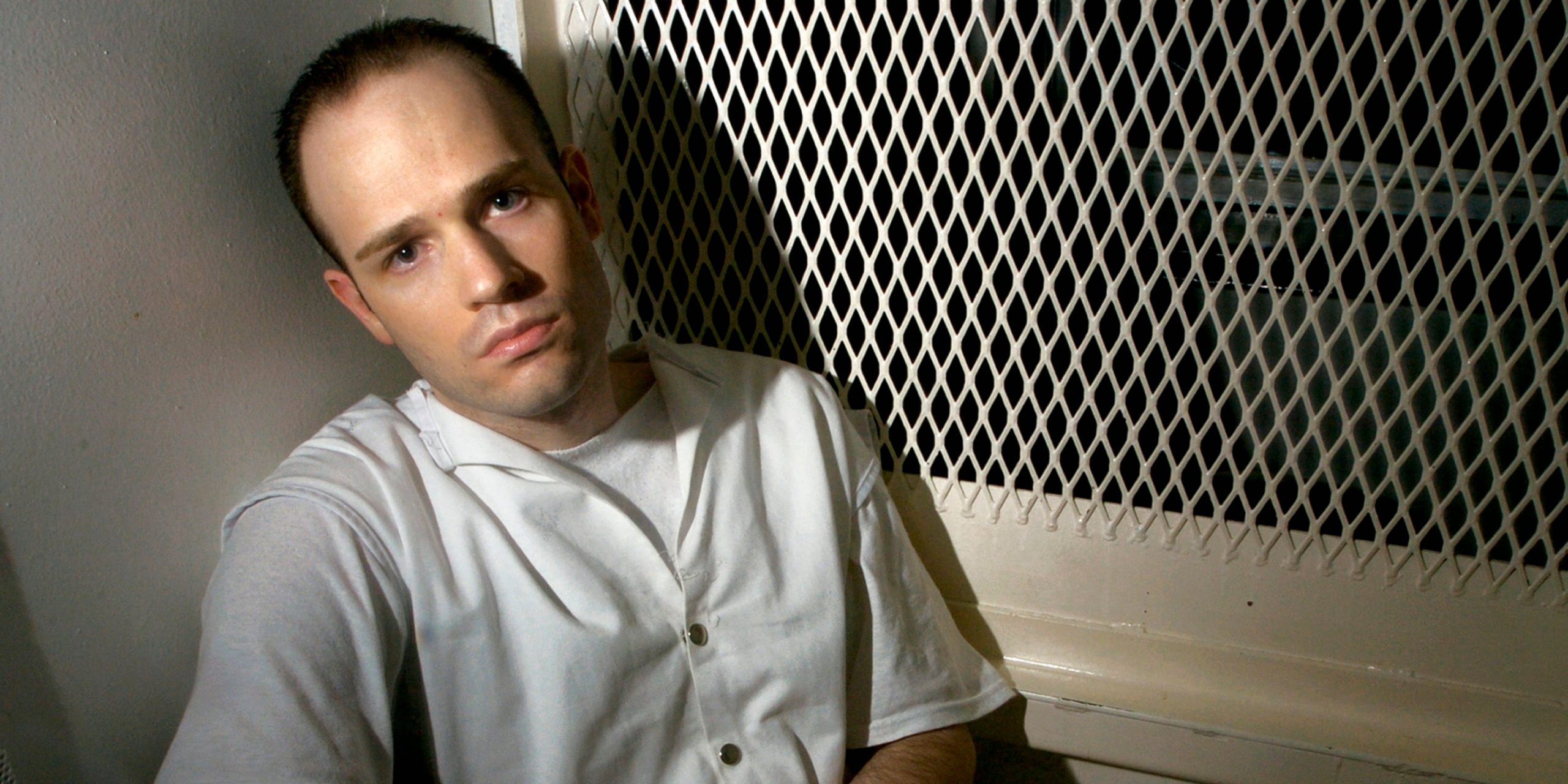 Randy Halprin sits in a visitation cell.