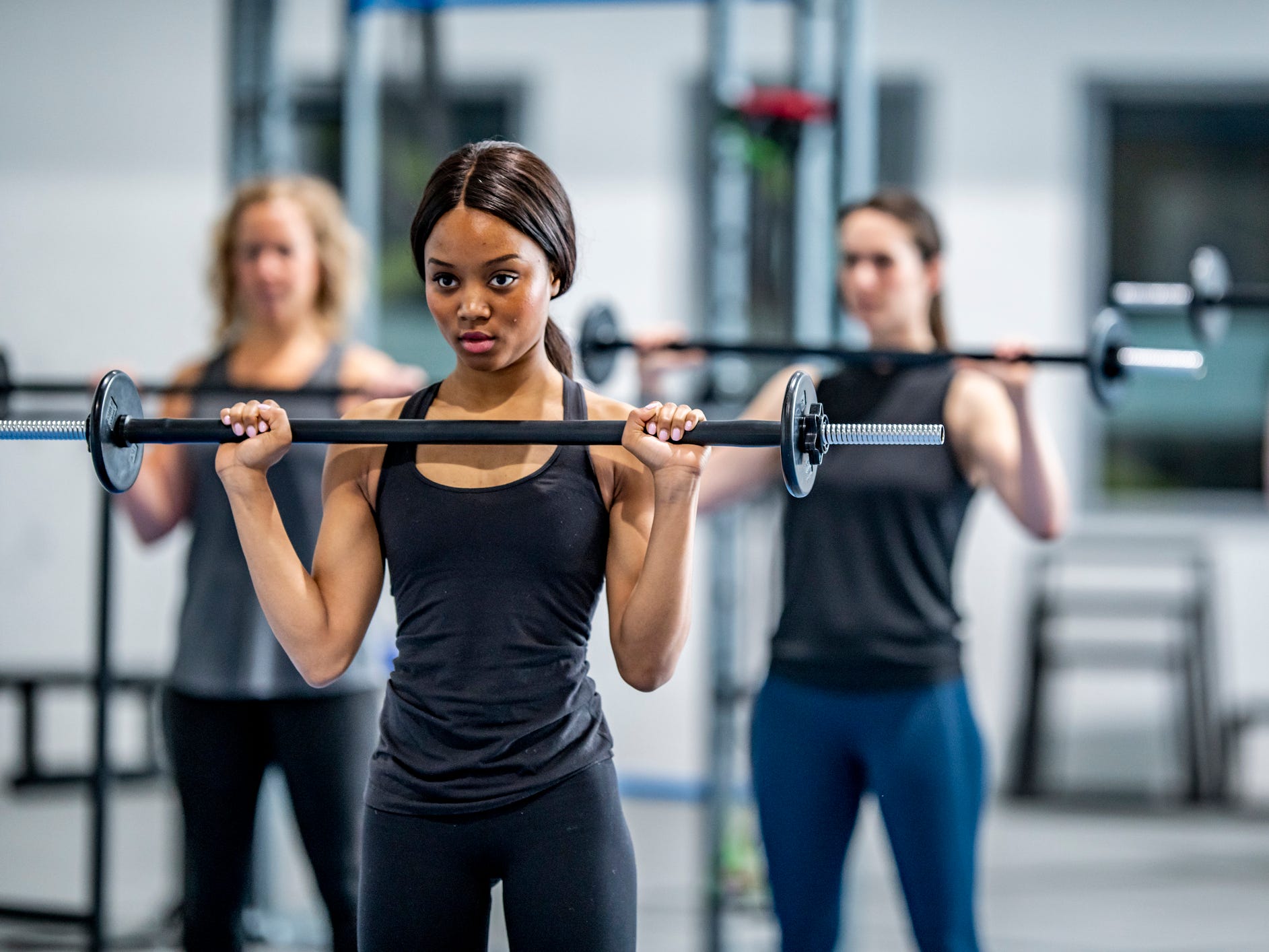 an athlete lifting a barbell