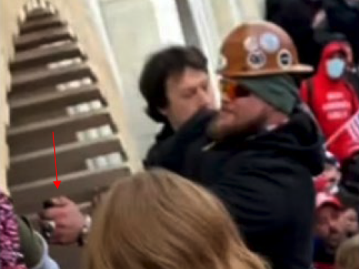 Capitol rioters spraying chemical agent at law enforcement