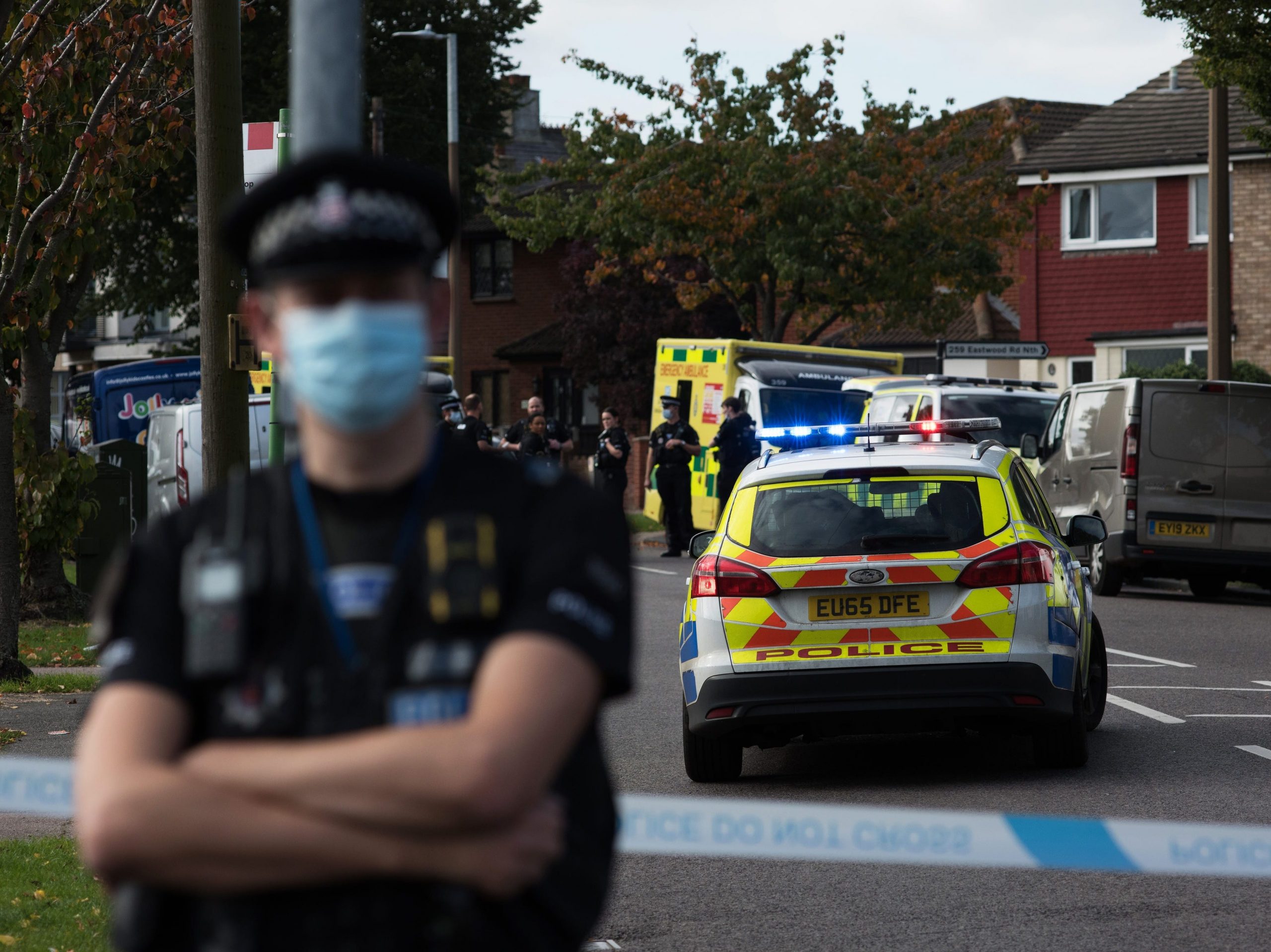 Police officers and ambulance crew attend following the stabbing of UK Conservative MP Sir David Amess as he met with constituents at a constituency surgery on October 15, 2021 in Leigh-on-Sea, England.