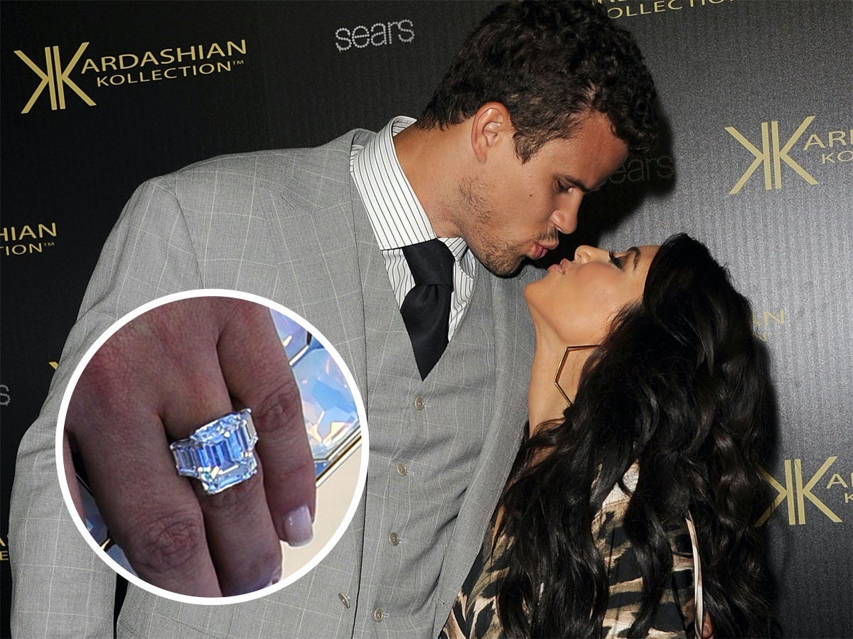 Kris Humphries and Kim Kardashian kiss with an inset of her engagement ring.