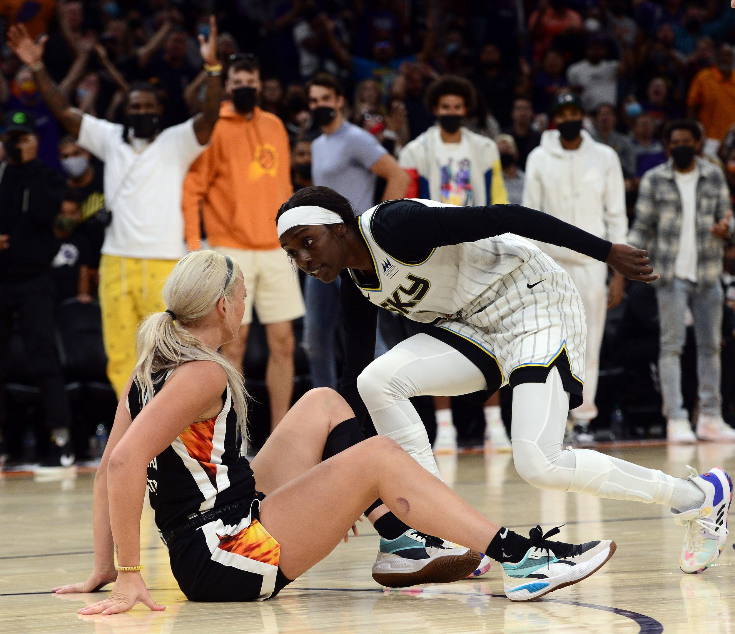 Copper stands over Phoenix Mercury guard Sophie Cunningham during Game 2 of the 2021 WNBA Finals.