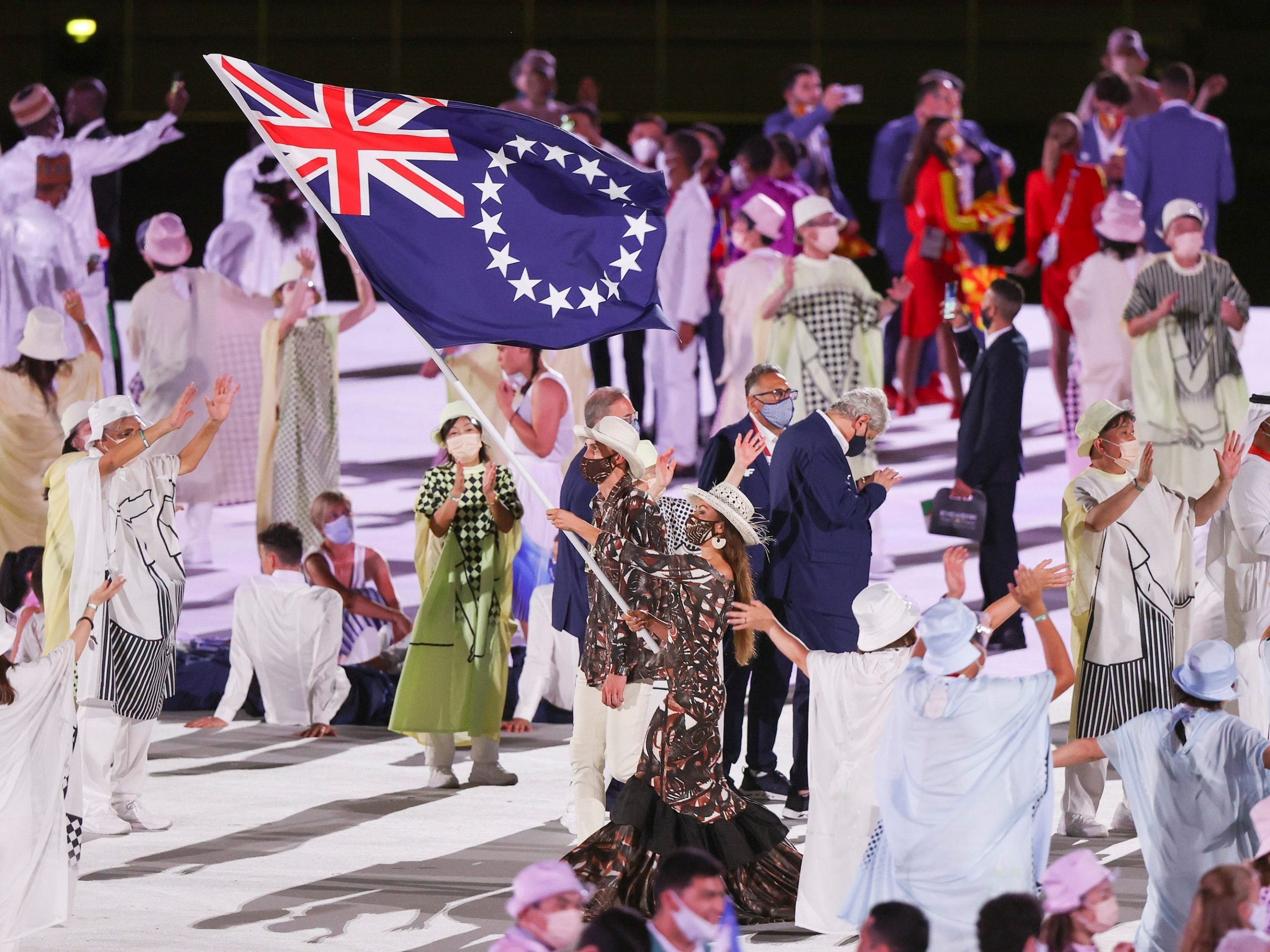 Flag bearers Kirsten Andrea Fisher-Marsters and Wesley Tikiariki Roberts of Team Cook Islands during the Opening Ceremony of the Tokyo 2020 Olympic Games