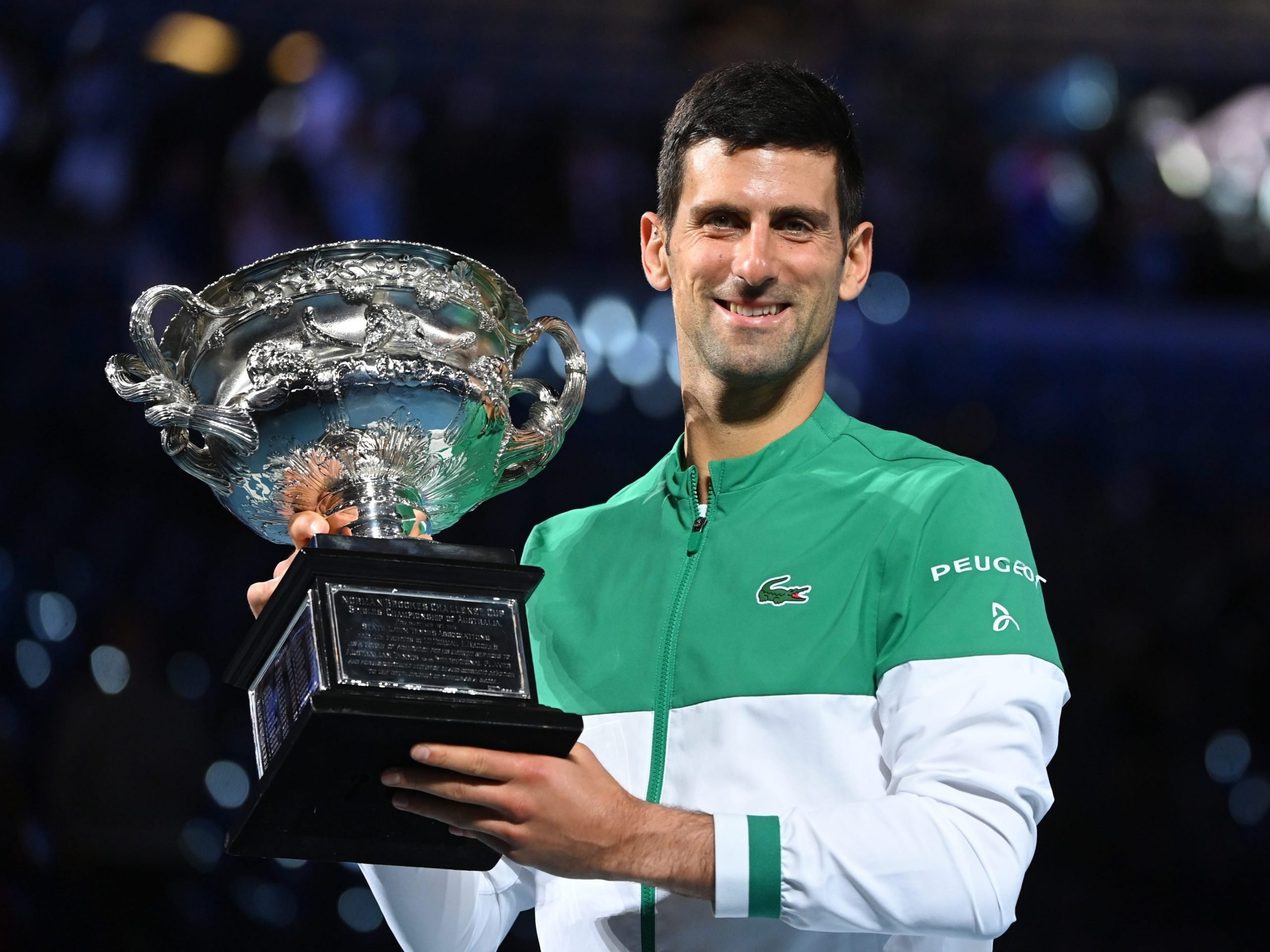 Novak Djokovic with the Australian Open trophy.