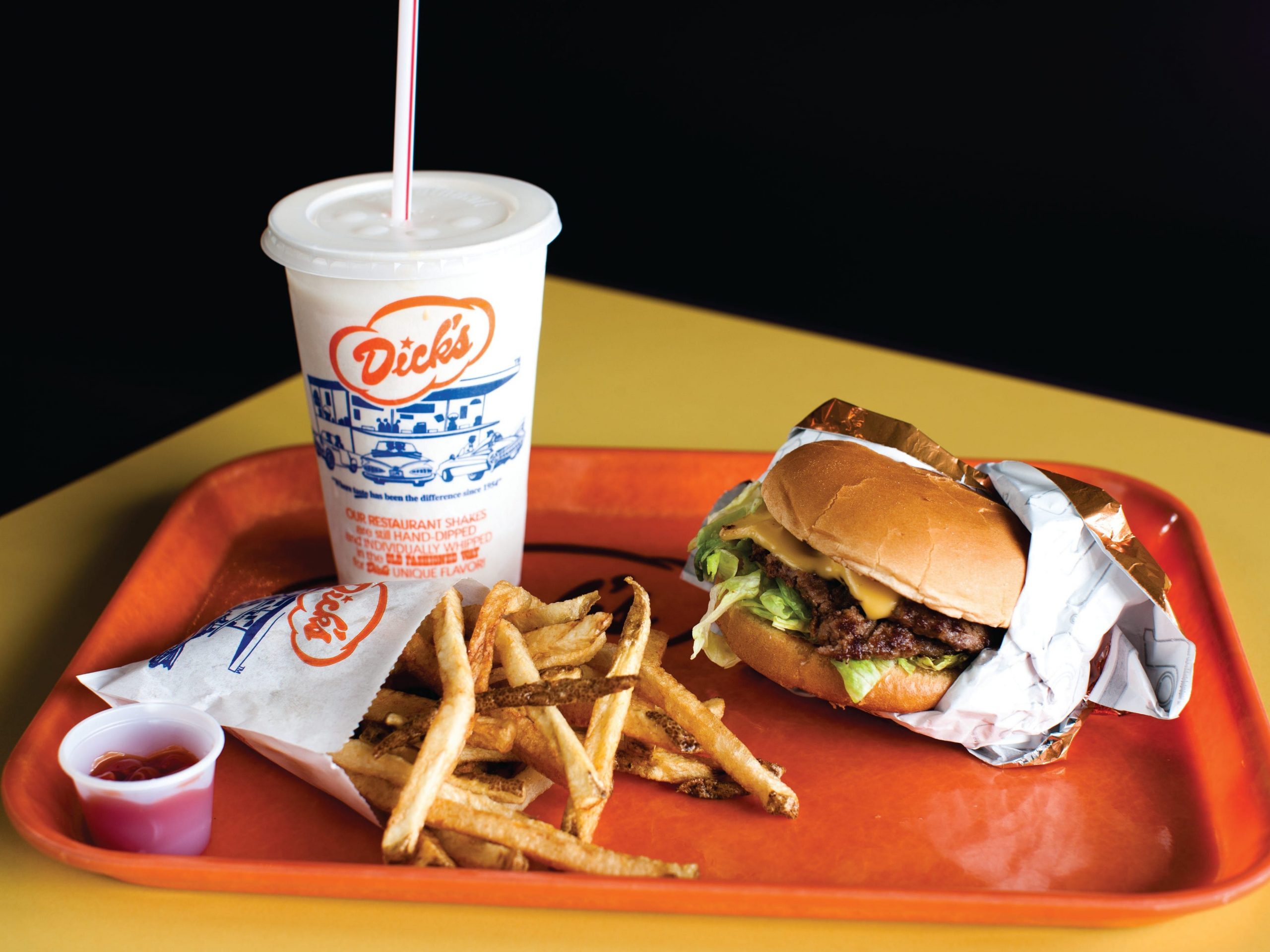 Dick's Drive-In Deluxe burger, shake, and fries.