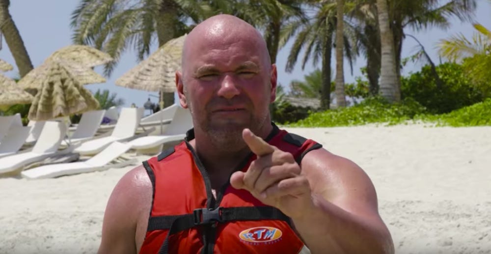 UFC boss Dana White on a beach.