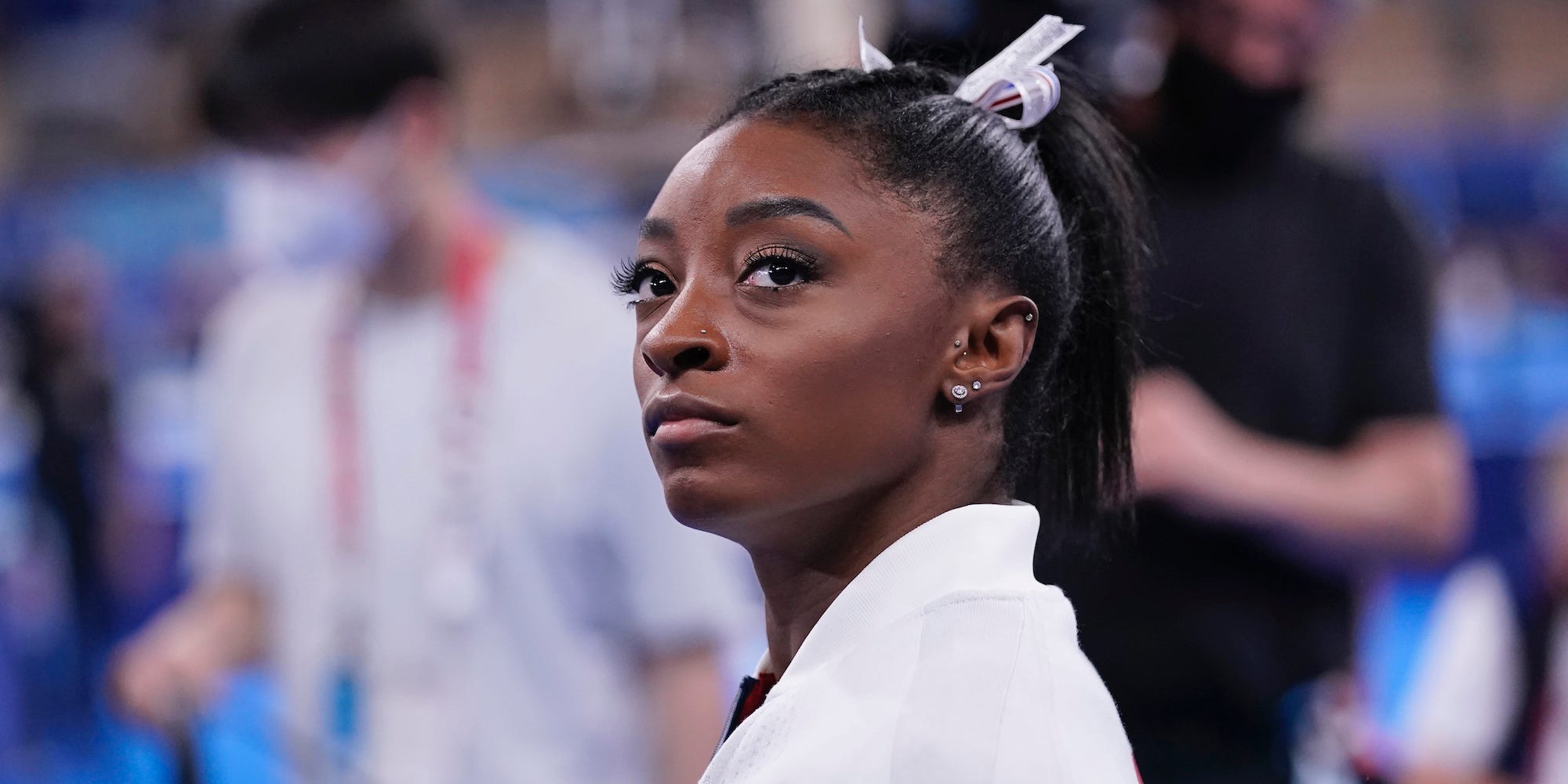 Simone Biles looks on during the Tokyo Olympics.