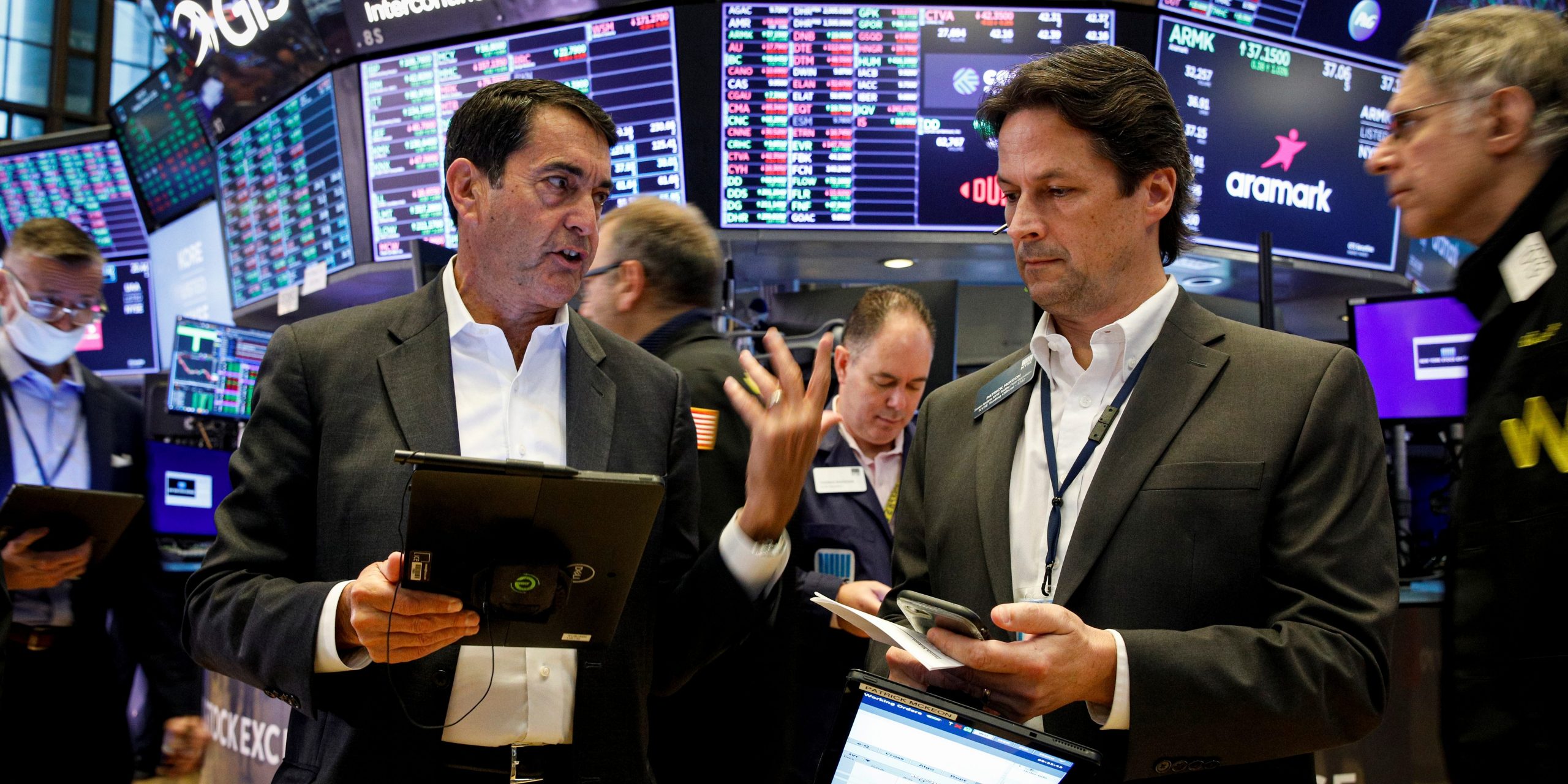 Traders work on the floor of the New York Stock Exchange (NYSE) in New York City, U.S., October 12, 2021.