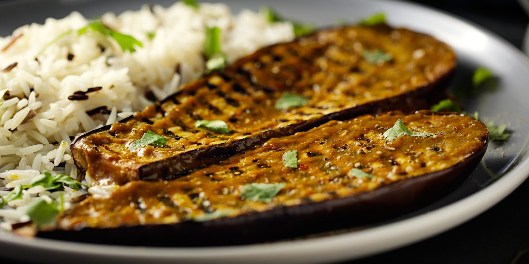 Grilled eggplant with a side of rice