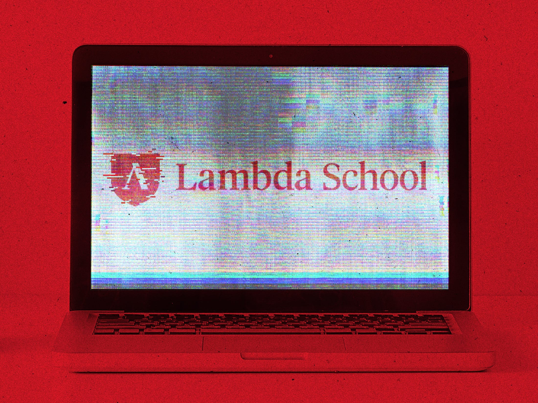 Laptop on a red background with the Lambda School logo on it.