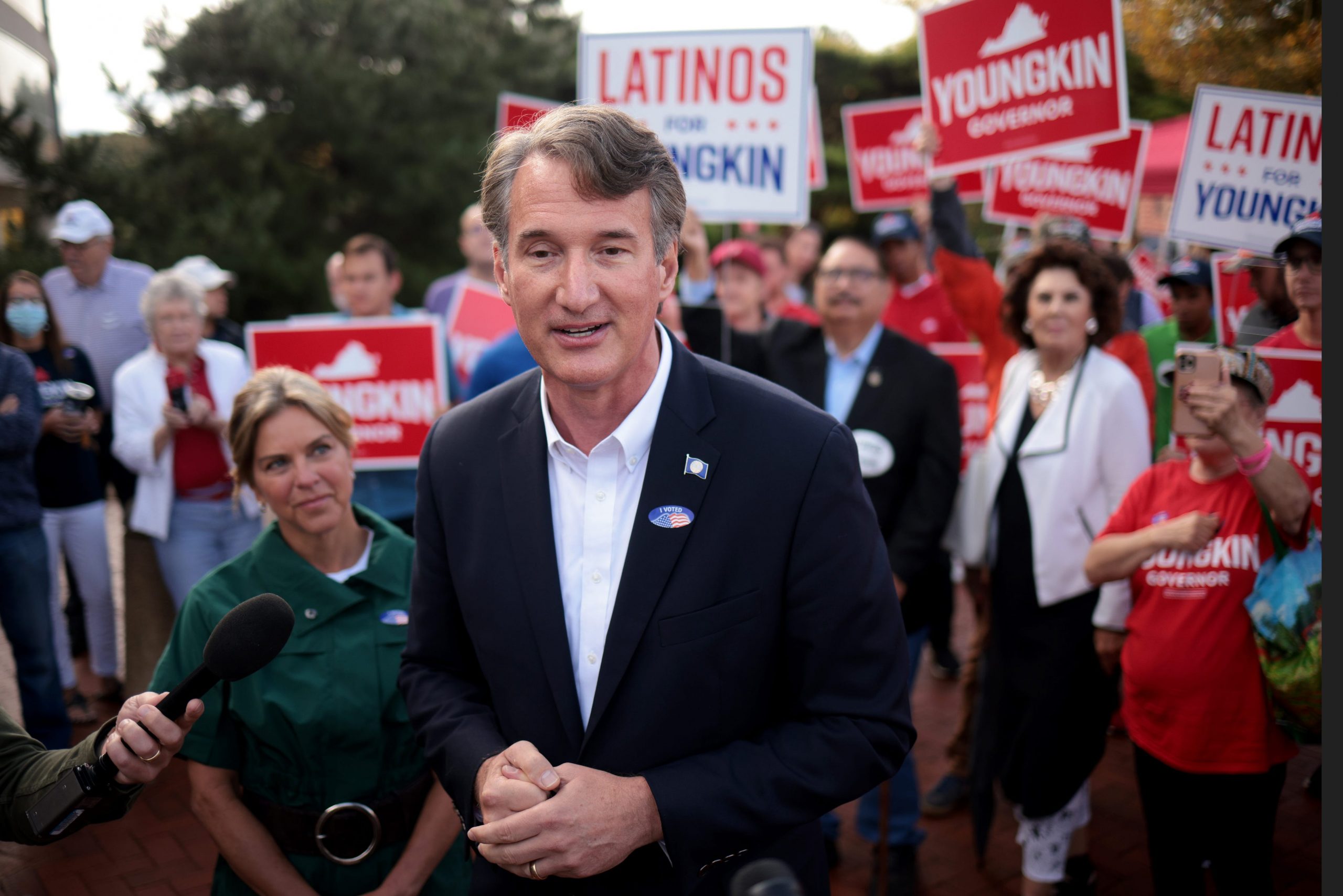 Republican gubernatorial candidate Glenn Youngkin speaks to members of the press after casting an early ballot September 23, 2021 in Fairfax, Virginia.