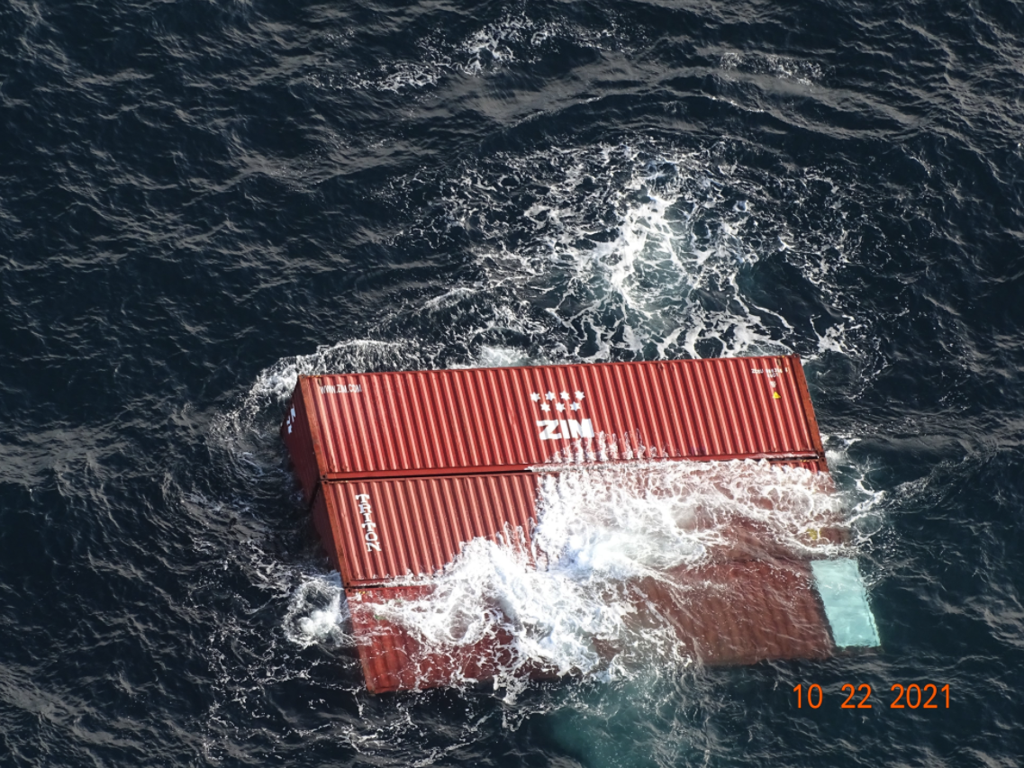 Shipping containers floating in the open ocean