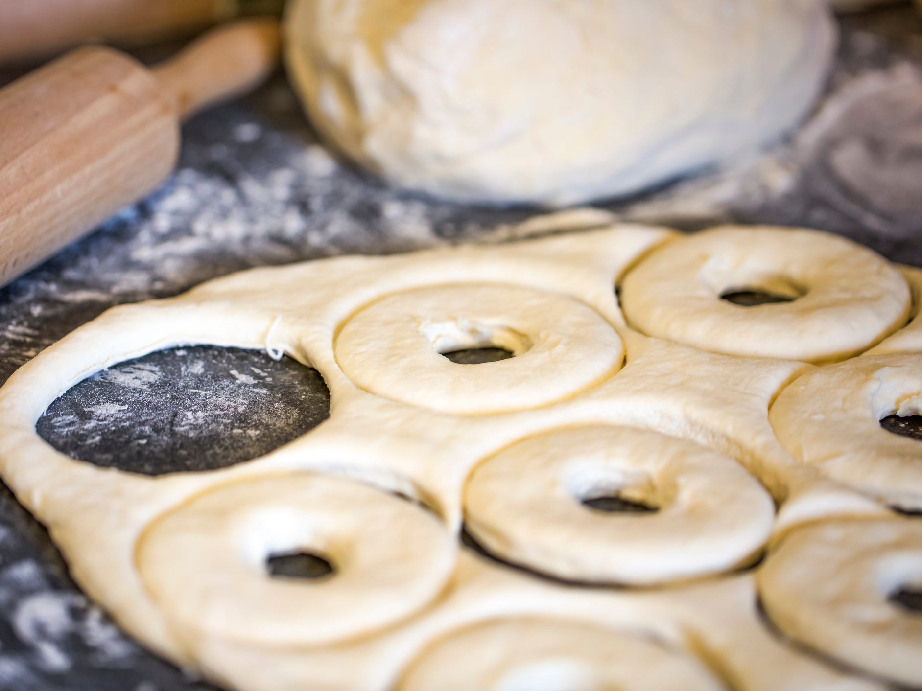 Donut dough on a table.