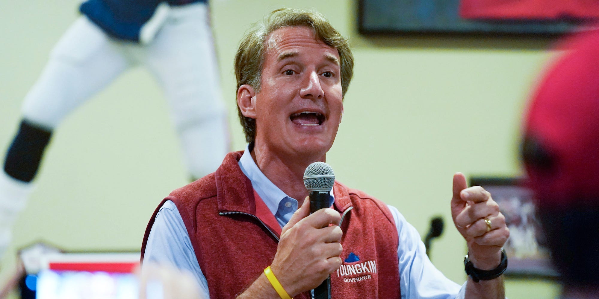 In this Oct. 11, 2021, file photo Virginia Republican gubernatorial candidate Glenn Youngkin talks to supporters during a meet and greet at a sports bar in Chesapeake, Va.