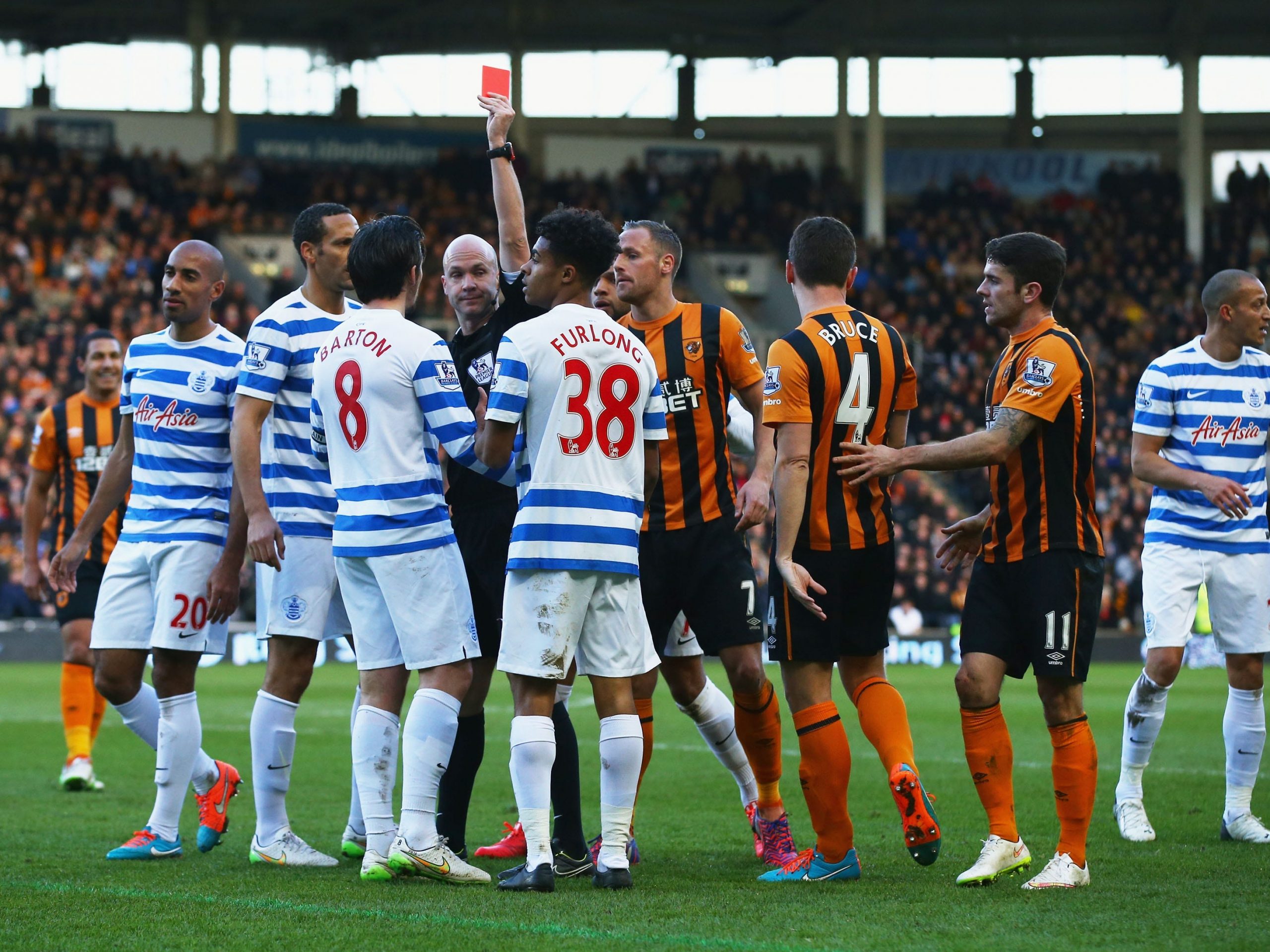 Joey Barton being shown a red card