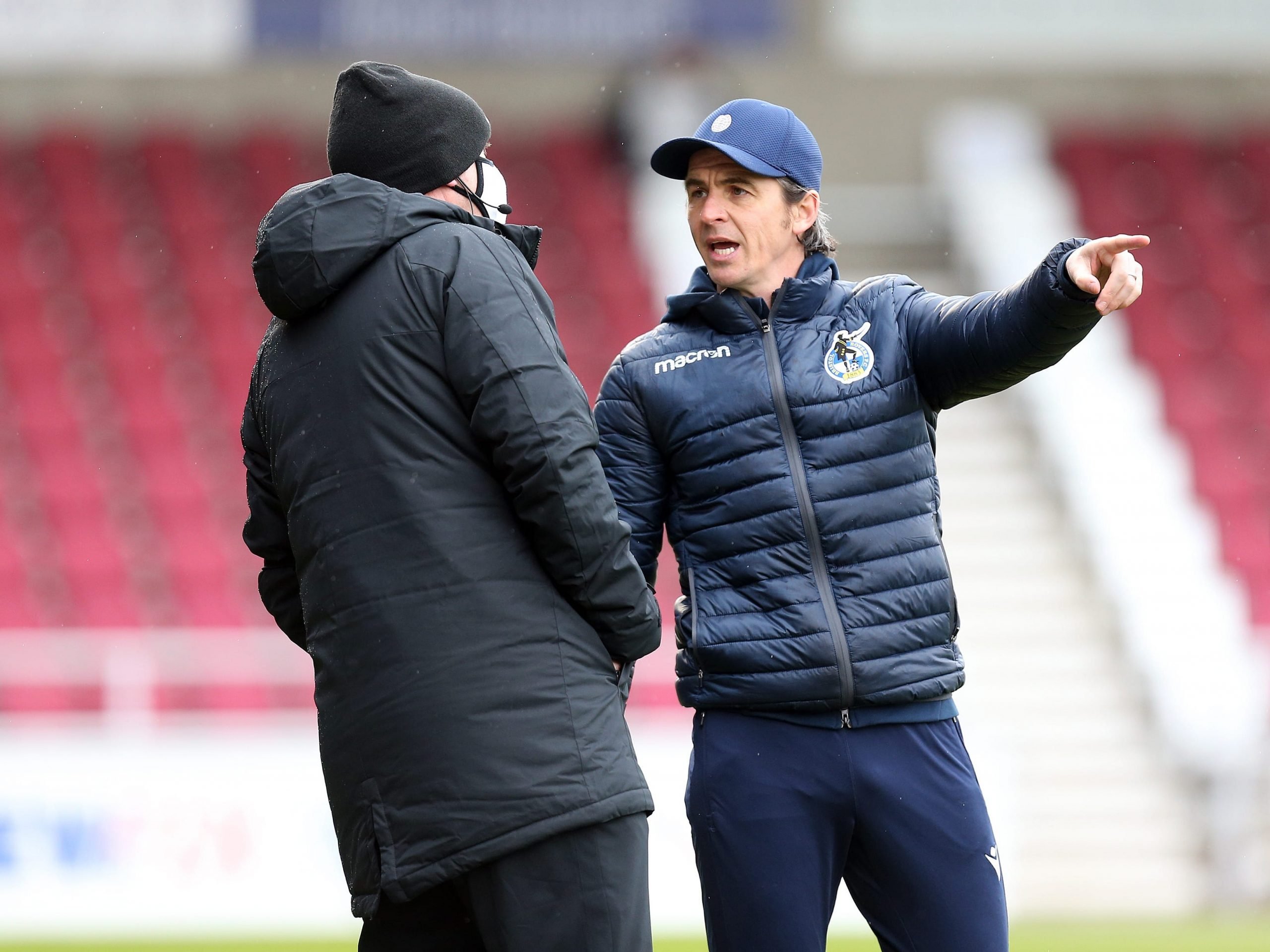 Joey Barton arguing with the fourth official versus Northampton Town.