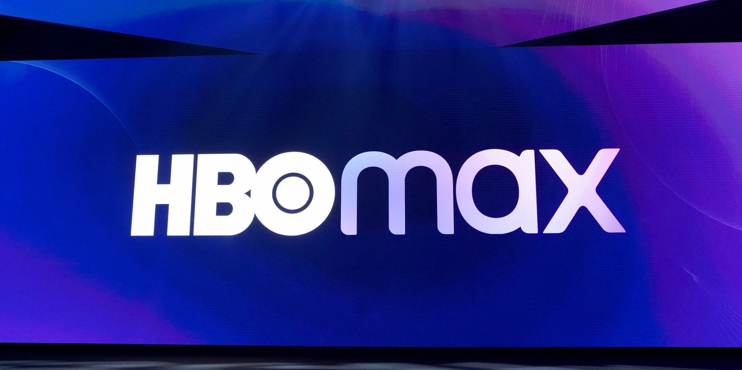 The HBO Max logo displayed on a large screen.