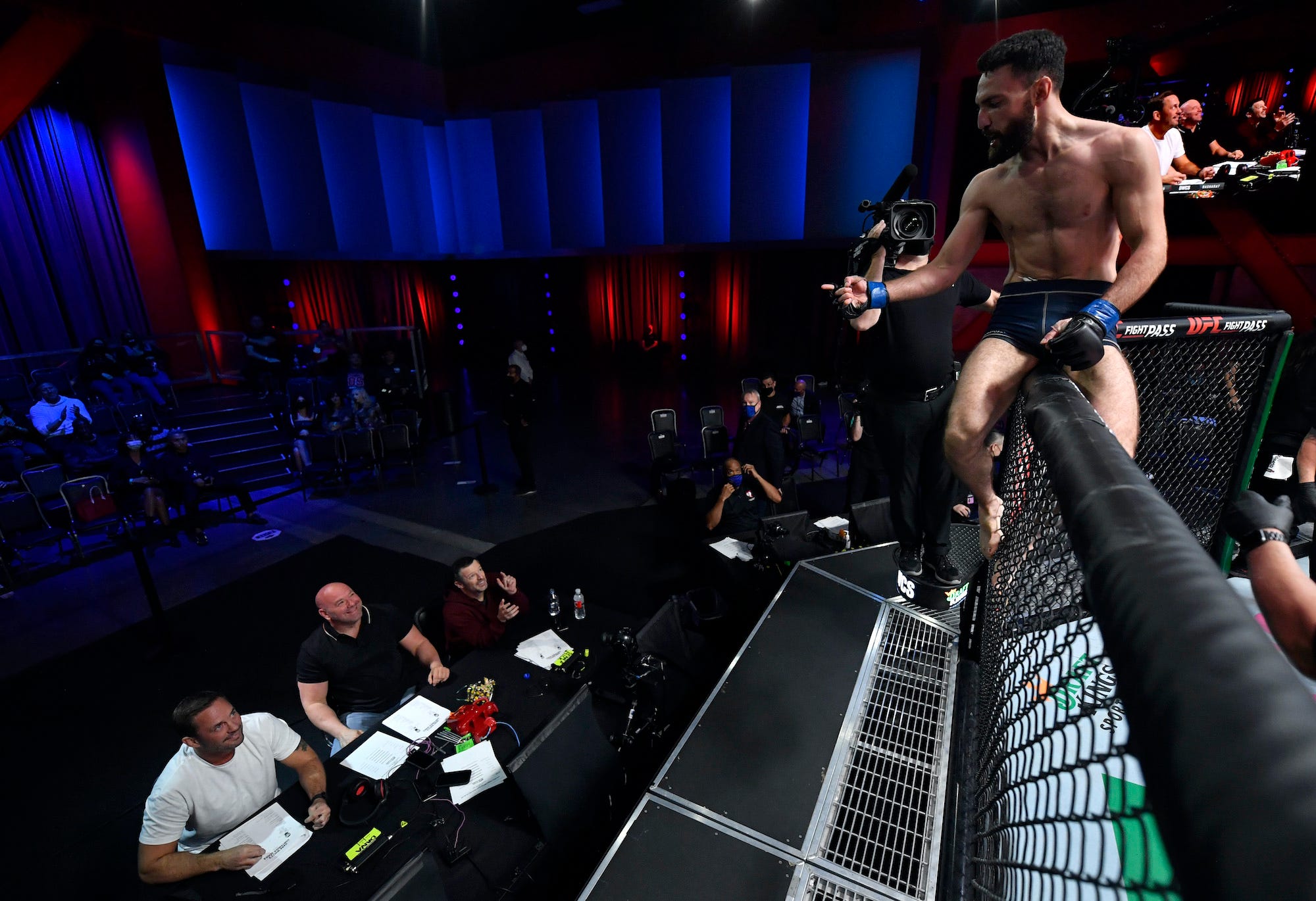 Javid Basharat celebrates in front of Dana White.