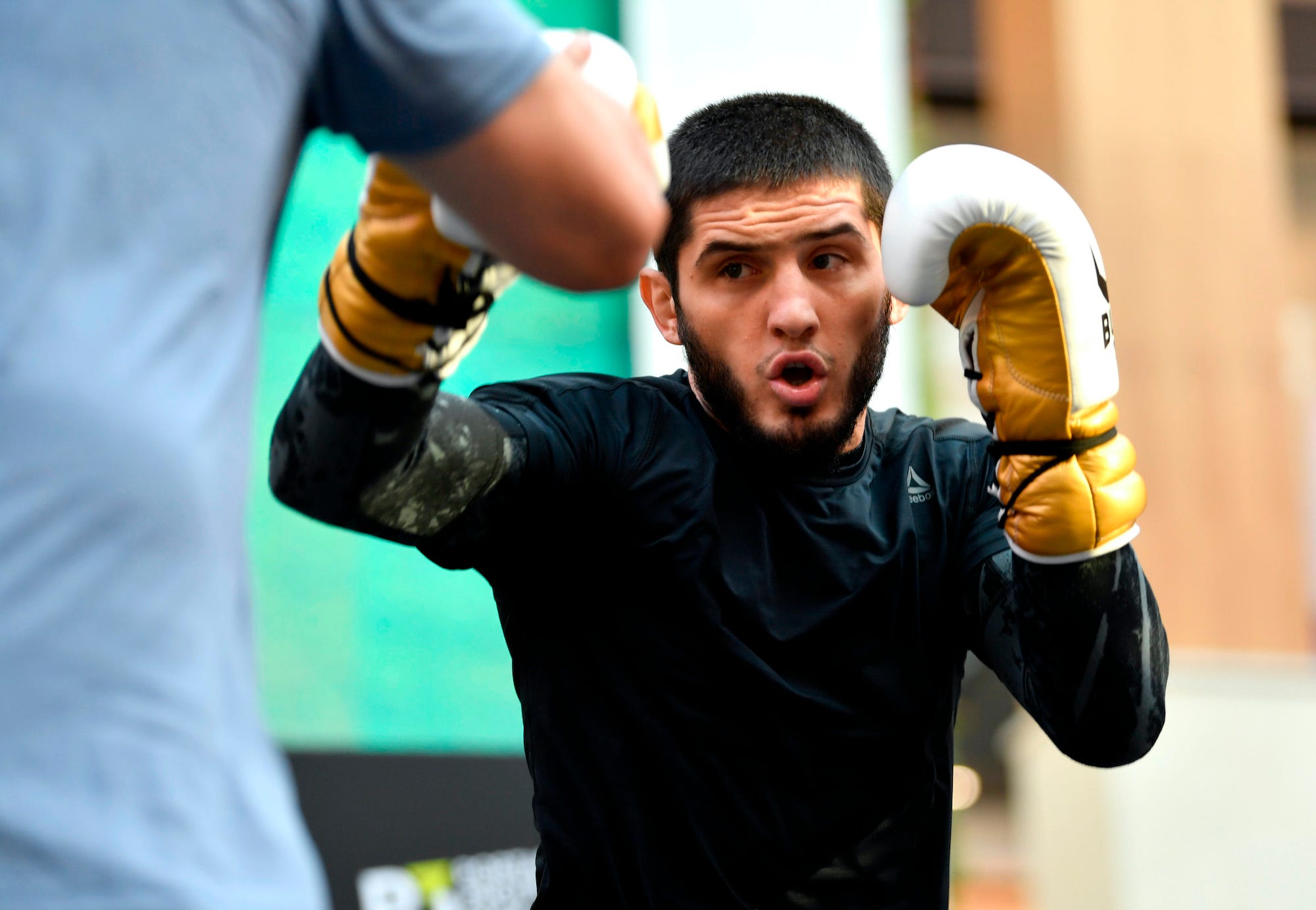 Islam Makhachev practises boxing ahead of his MMA contests.
