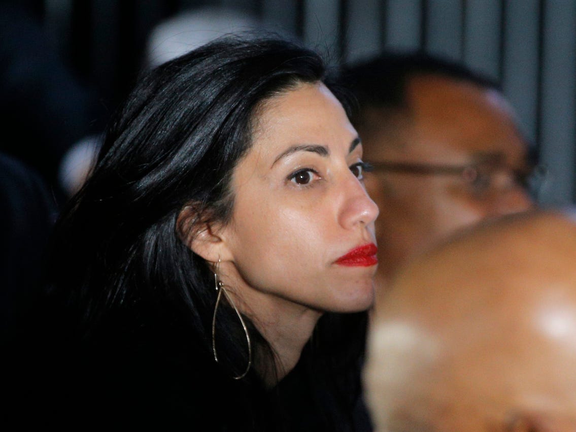 Huma Abedin, longtime aide to Democratic U.S. presidential candidate Hillary Clinton, attends a Clinton campaign rally in Charlotte, North Carolina, U.S., July 5, 2016. REUTERS/Brian Snyder/File Photo