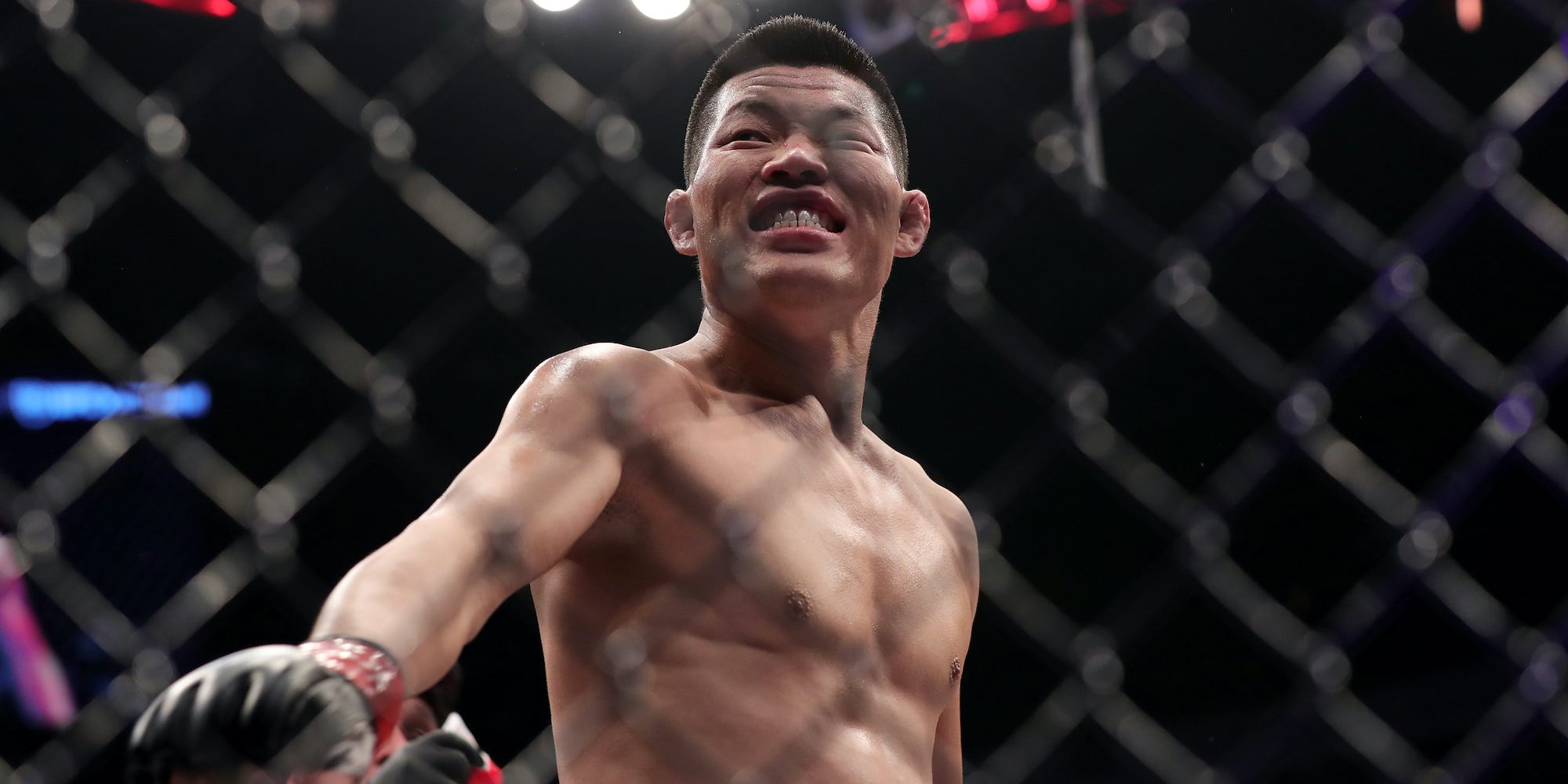 Li Jingliang celebrates a recent win inside the UFC Octagon.