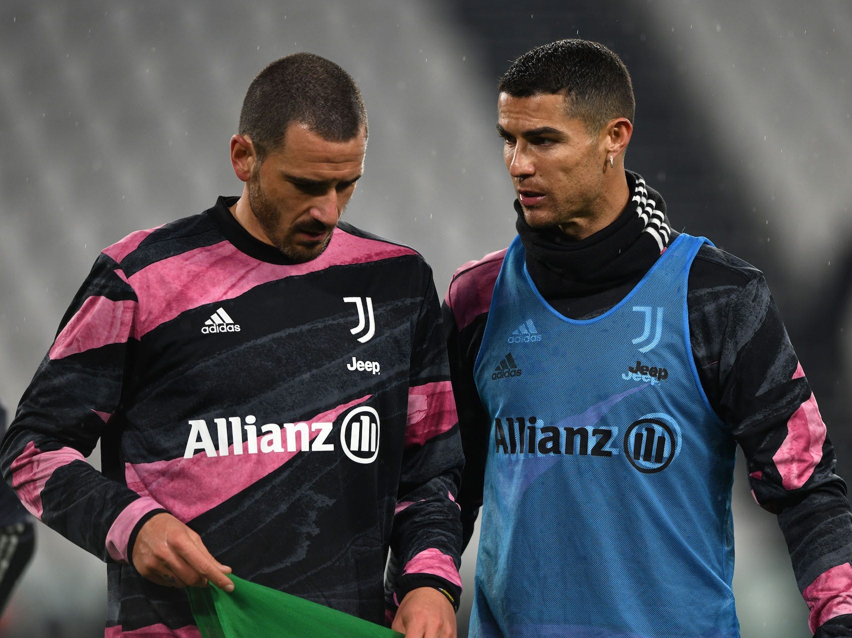 Cristiano Ronaldo of Juventus and Leonardo Bonucci of Juventus (L) during warm up during the Serie A match between Juventus and Torino FC at Allianz Stadium