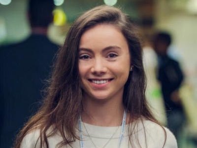 headshot of  Sophie Healy-Thow in white shirt