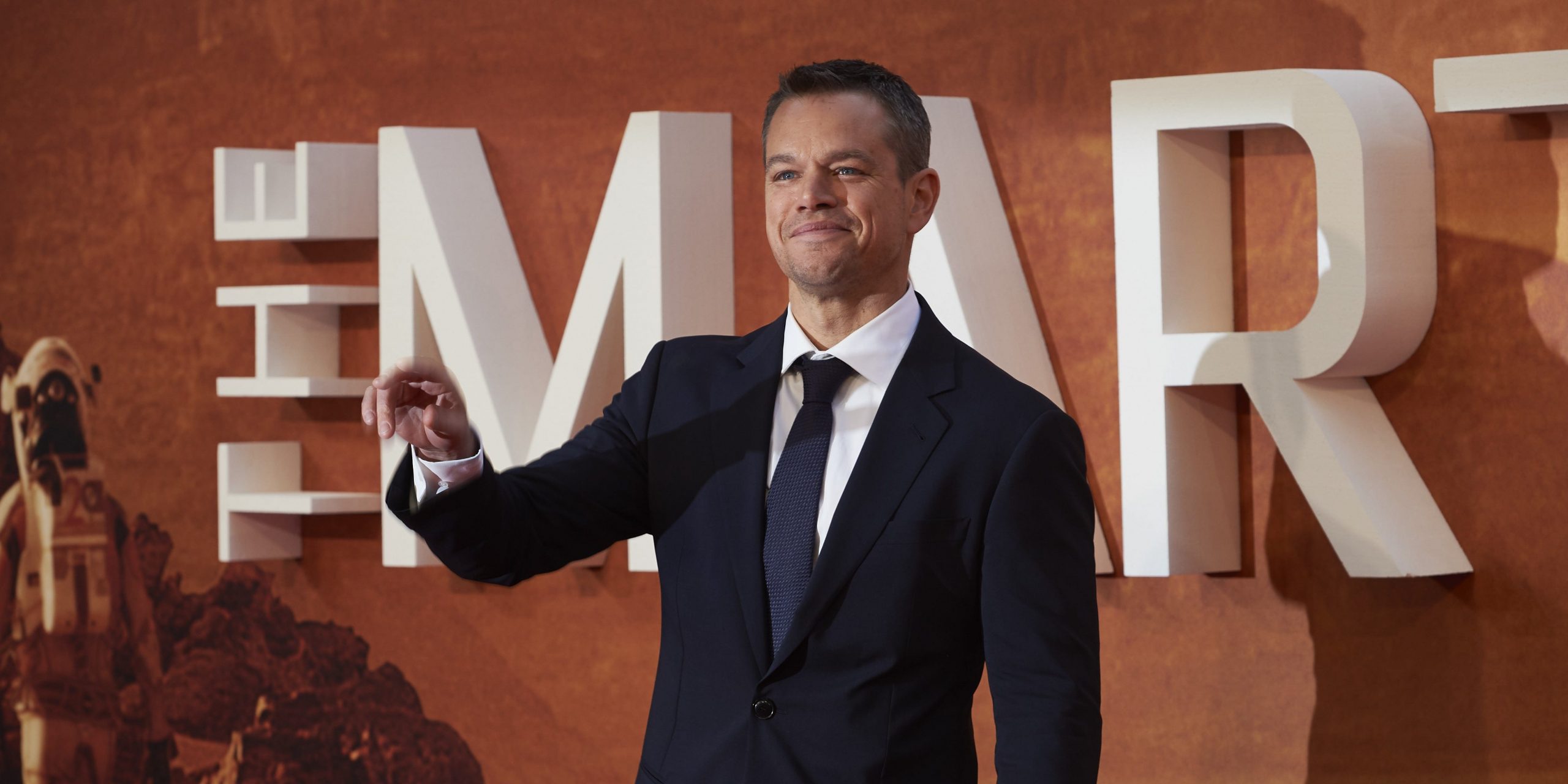 US actor Matt Damon poses for photographers as he arrives for the European premiere of "The Martian" in London's Leicester square on September 24, 2015.