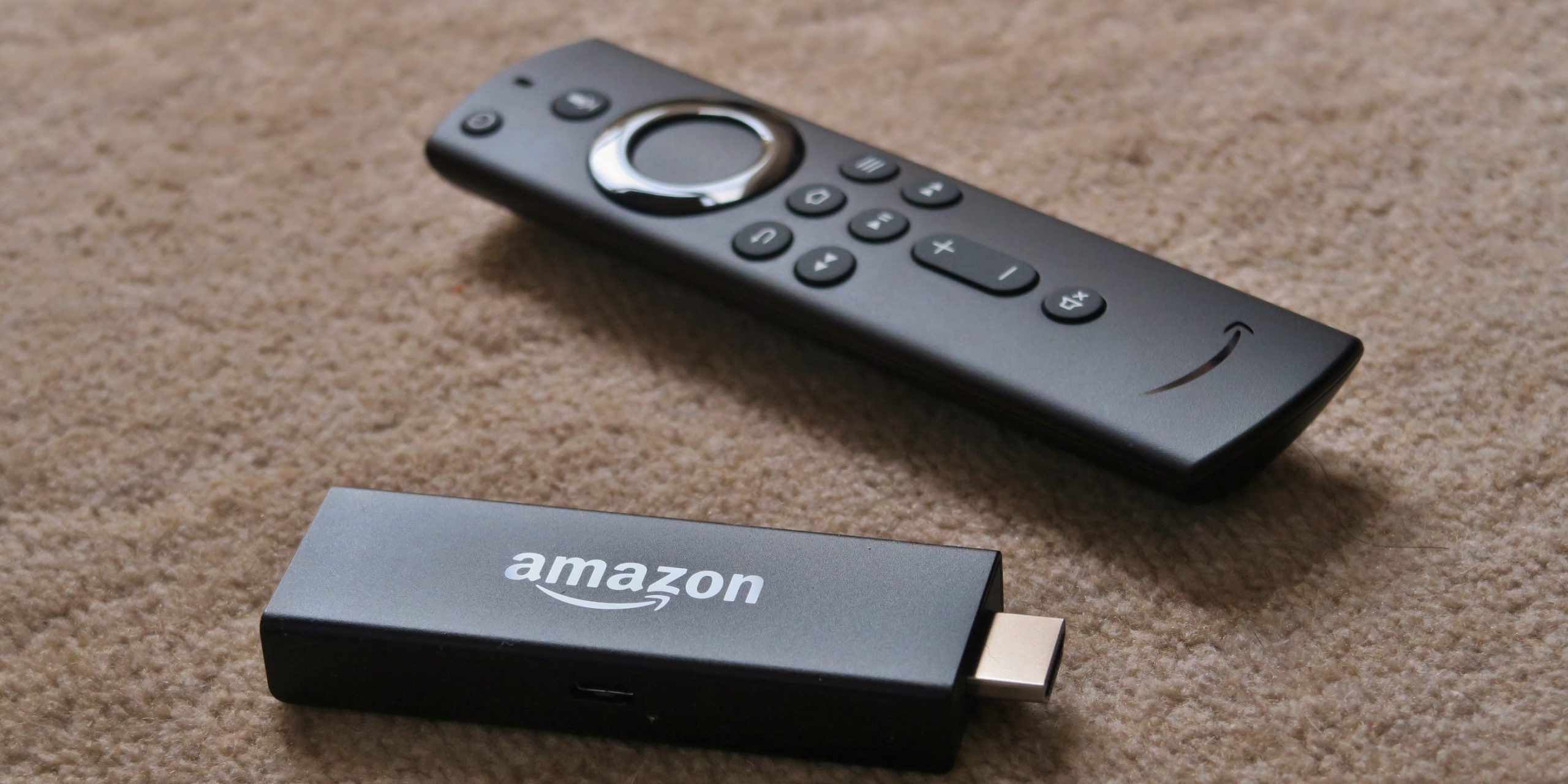 An Amazon Fire TV Stick and remote.