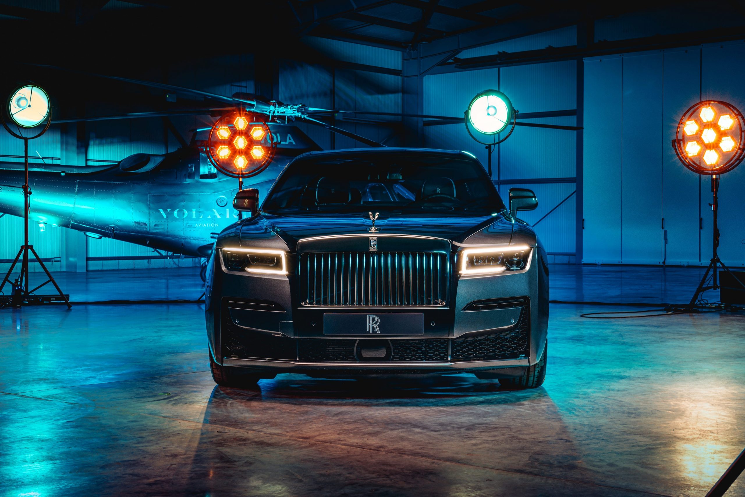 The Rolls-Royce Ghost Black Badge at night.