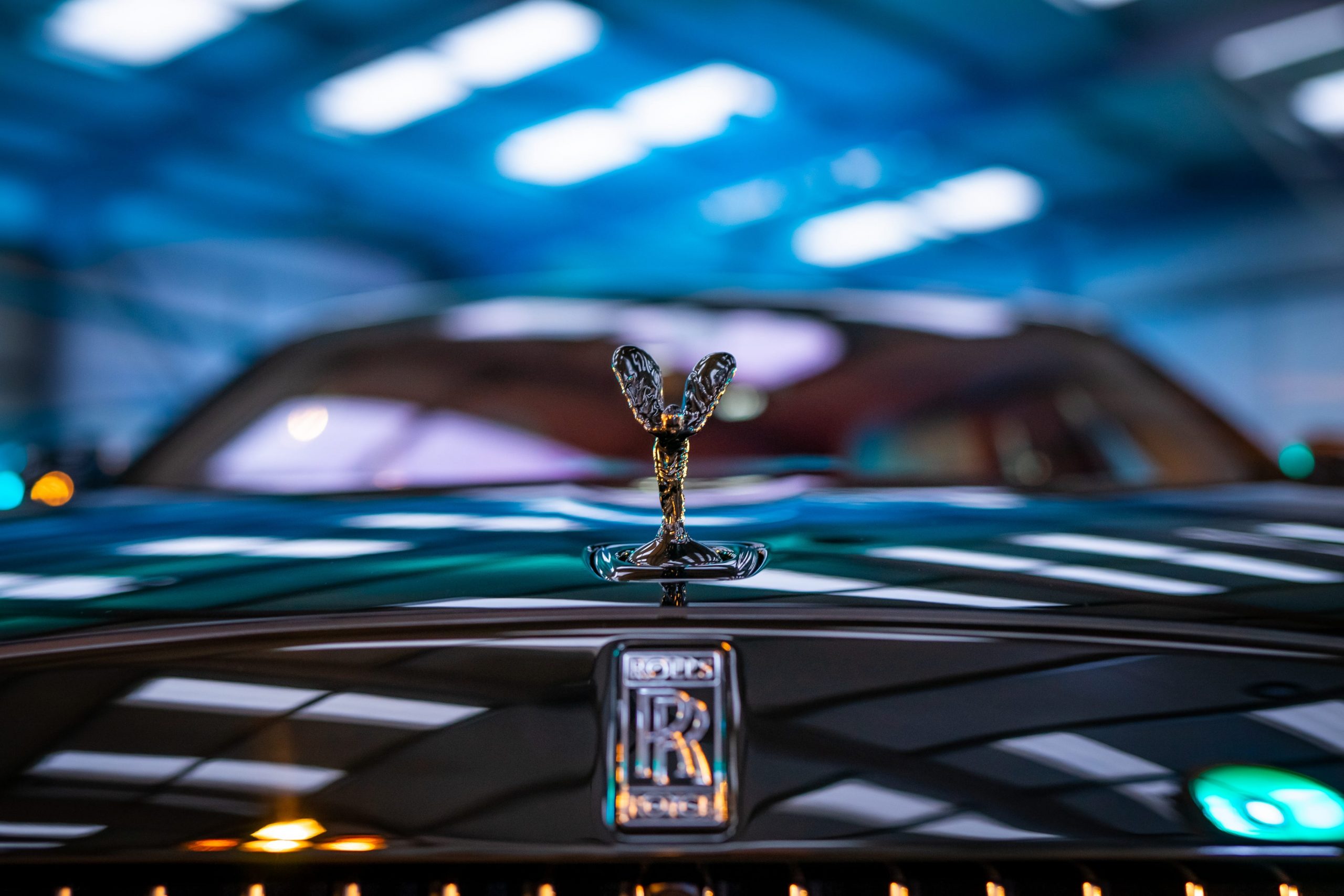 The Rolls-Royce Ghost Black Badge at night.