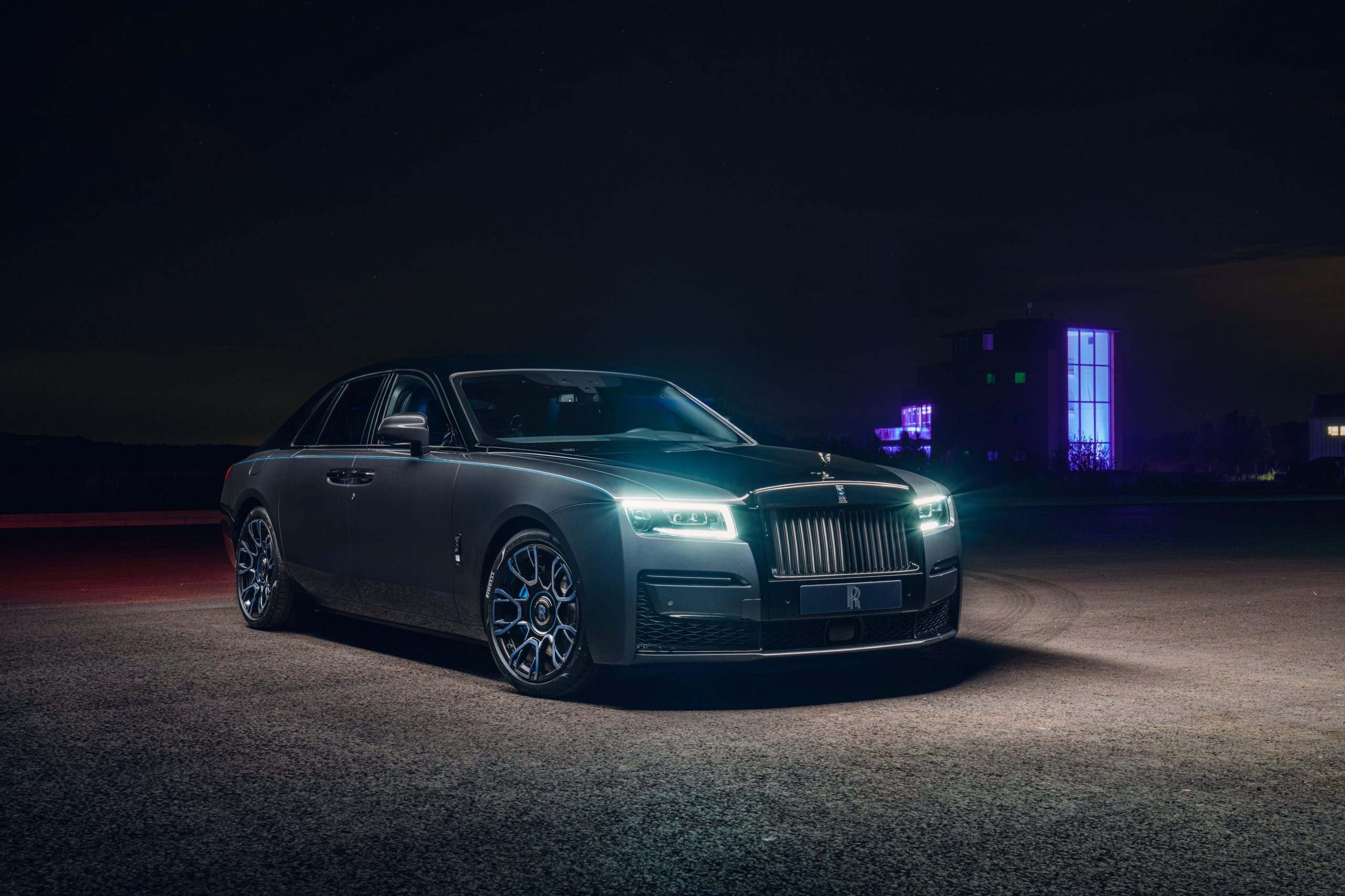 The Rolls-Royce Ghost Black Badge at night.