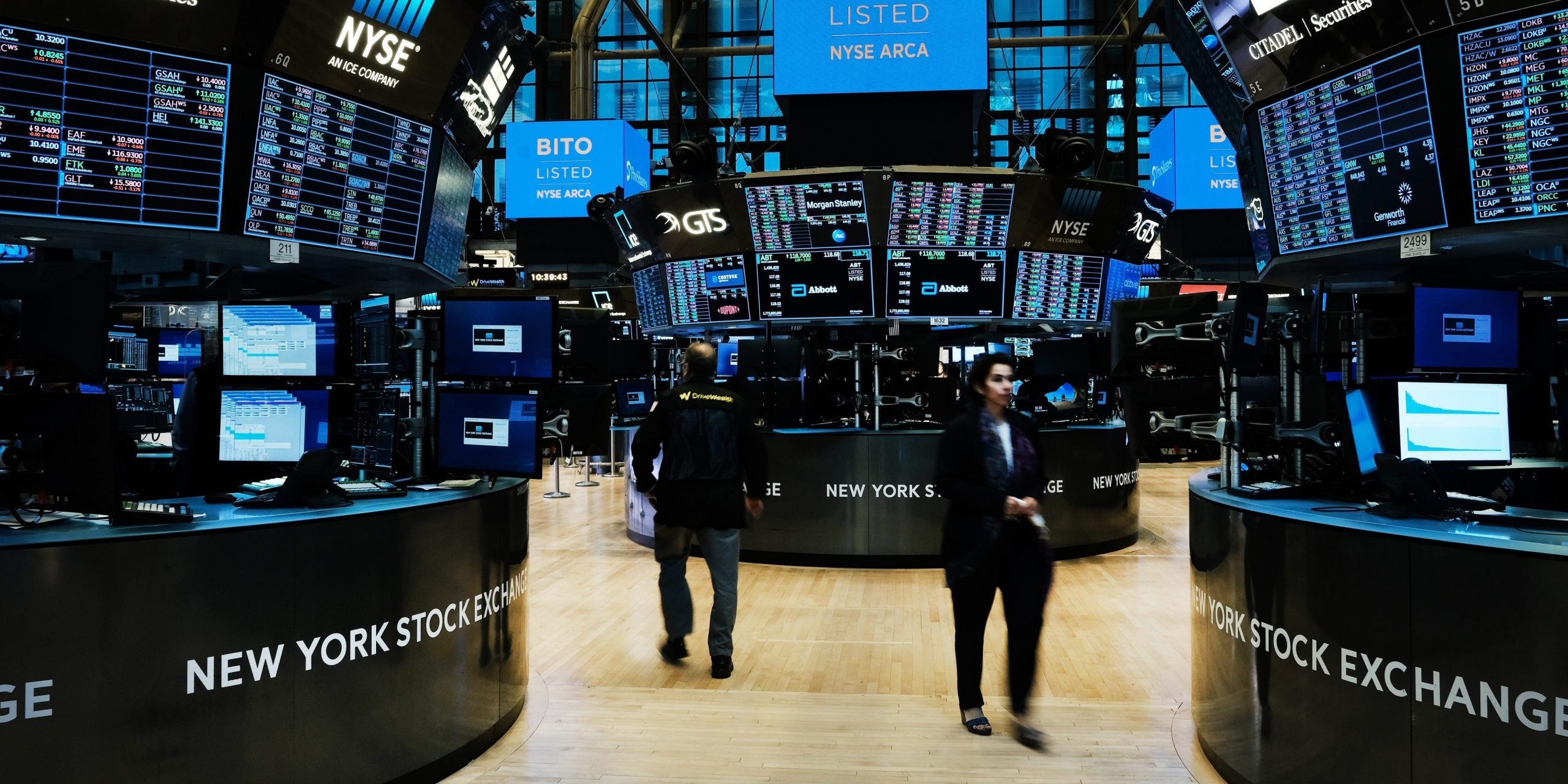 An electric banner for the newly listed ProShares Bitcoin Strategy ETF is displayed on the floor of the New York Stock Exchange (NYSE) on October 19, 2021 in New York City.